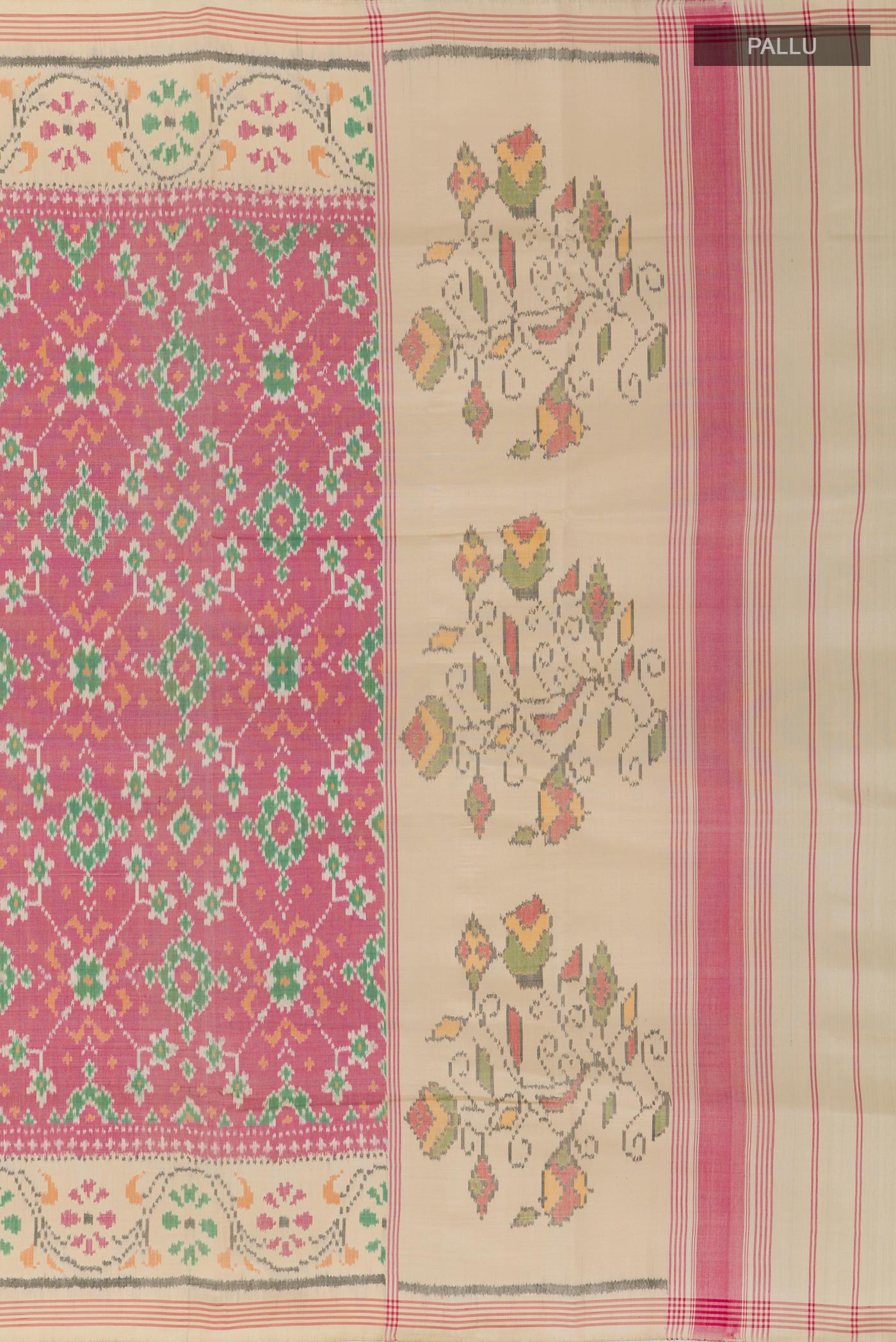 Close up image of the pallu of Off White Rajkot Patola Silk Saree with Ikat design on the body and Zari Border. 