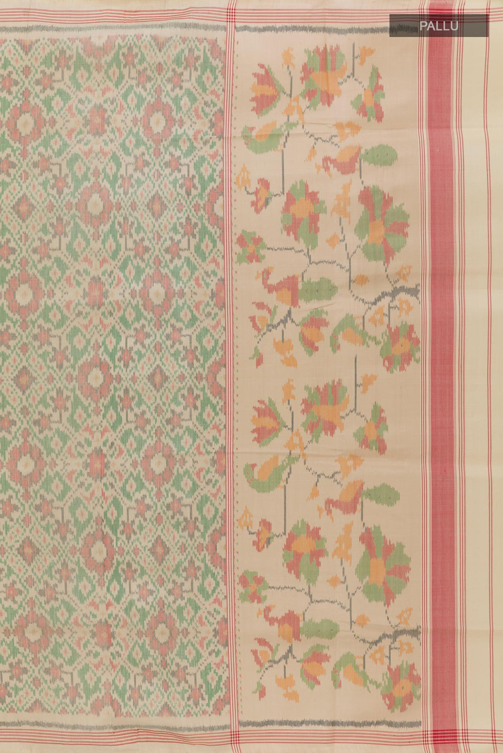 Close up image of the pallu of Cream Rajkot Patola Silk Saree with Pure Ikat on the body and Zari Border. 