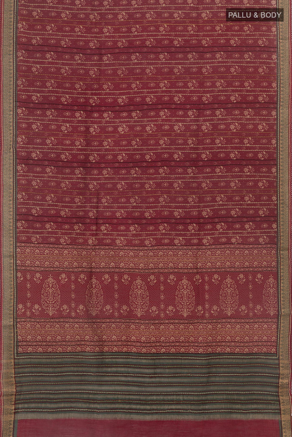 Flat view of Maroon Tussar Saree with Printed design on the body and Zari Border. 