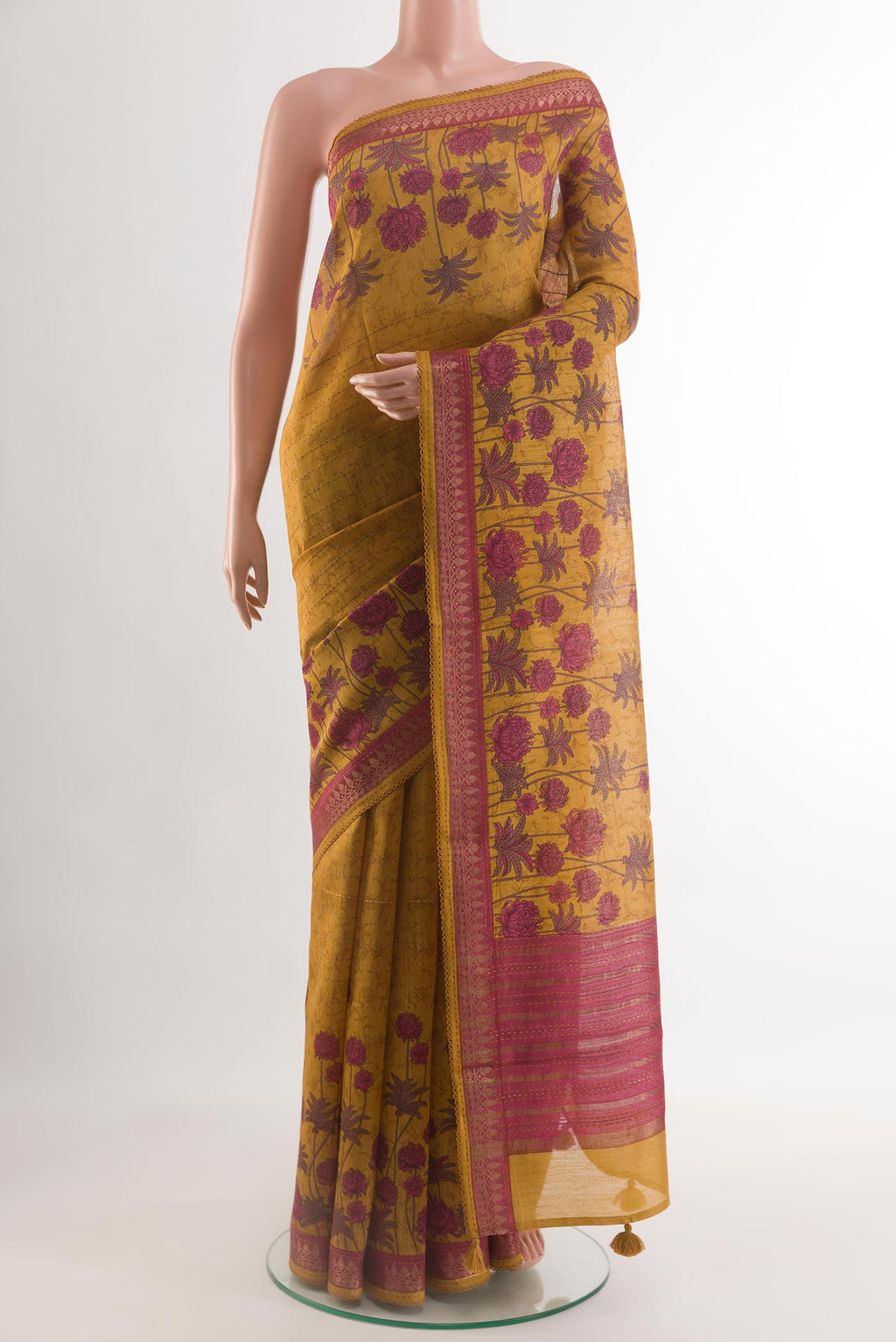 Mustard Tussar Silk Saree with Stripes on the body and Zari Border.  displayed on a mannequin