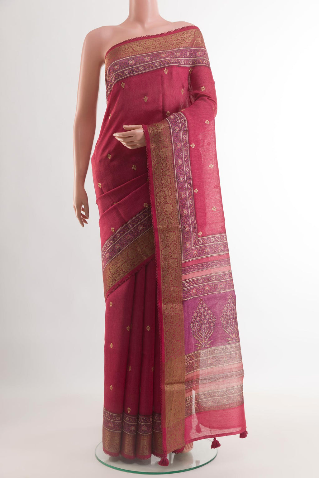 Red Tussar Silk Saree with Embroidery on the body and Zari Border.  displayed on a mannequin