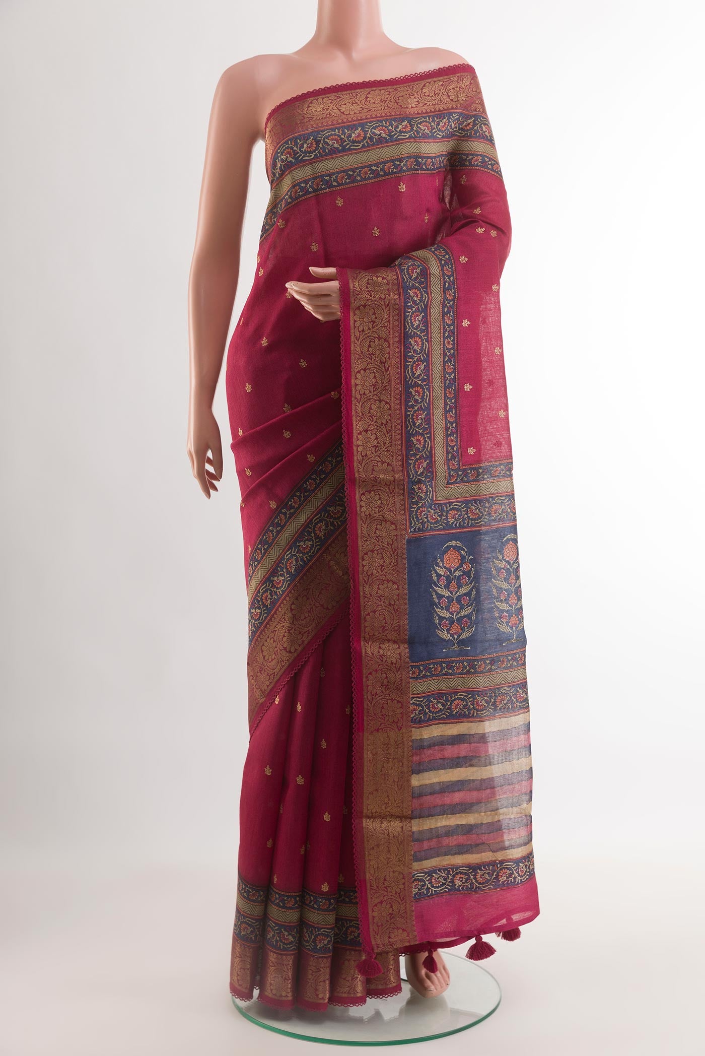Dark Pink Tussar Silk Saree with Zari Butta on the body and Zari Border.  displayed on a mannequin