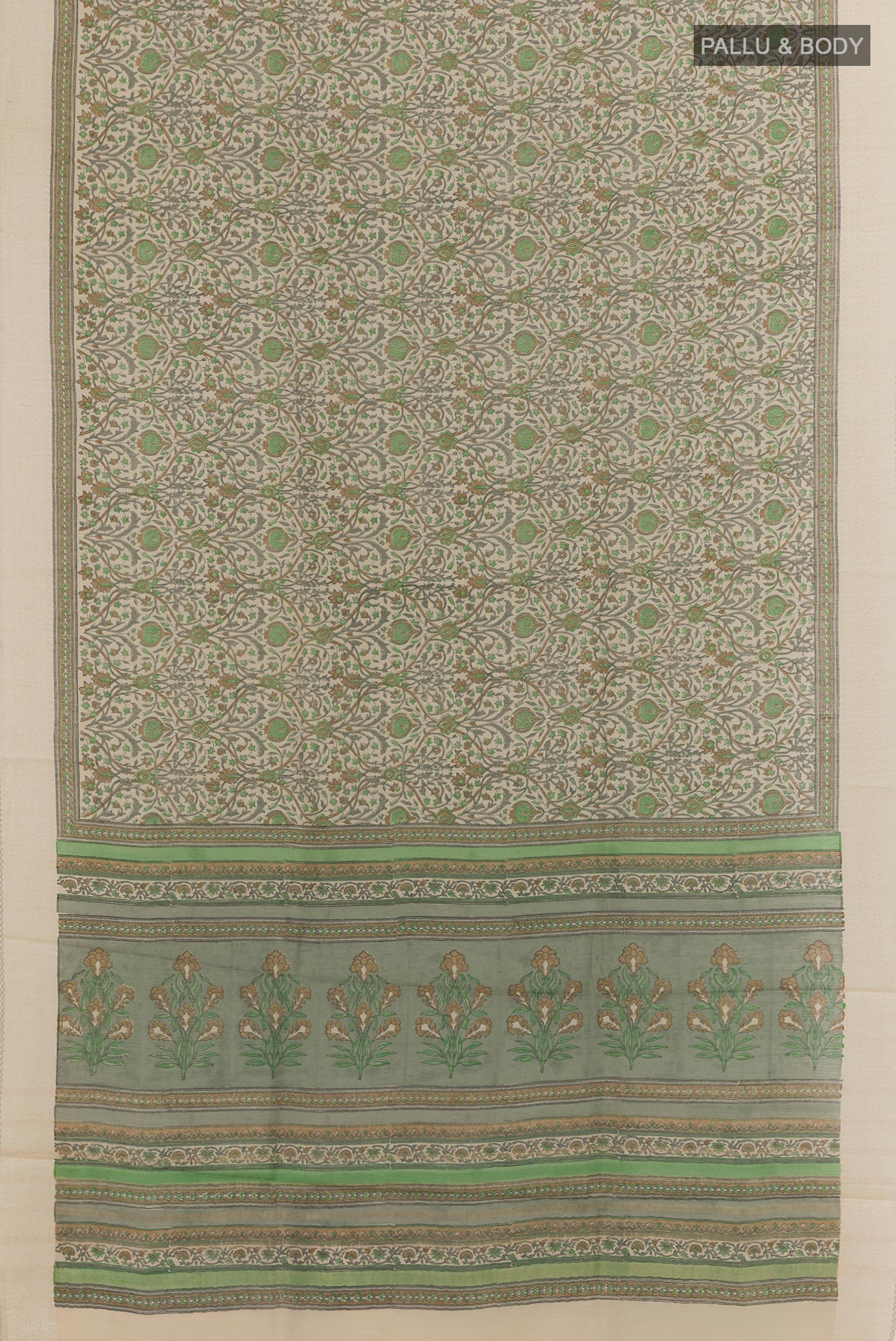 Flat view of Green Tussar Silk Saree with Printed design on the body and Zari Border. 