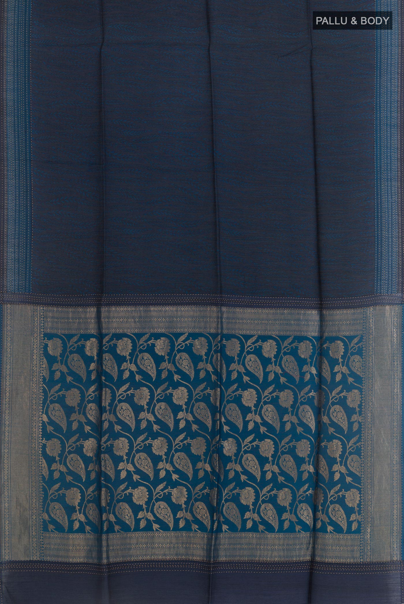Flat view of Blue Tussar Silk Saree with Stripes on the body and Zari Border. 