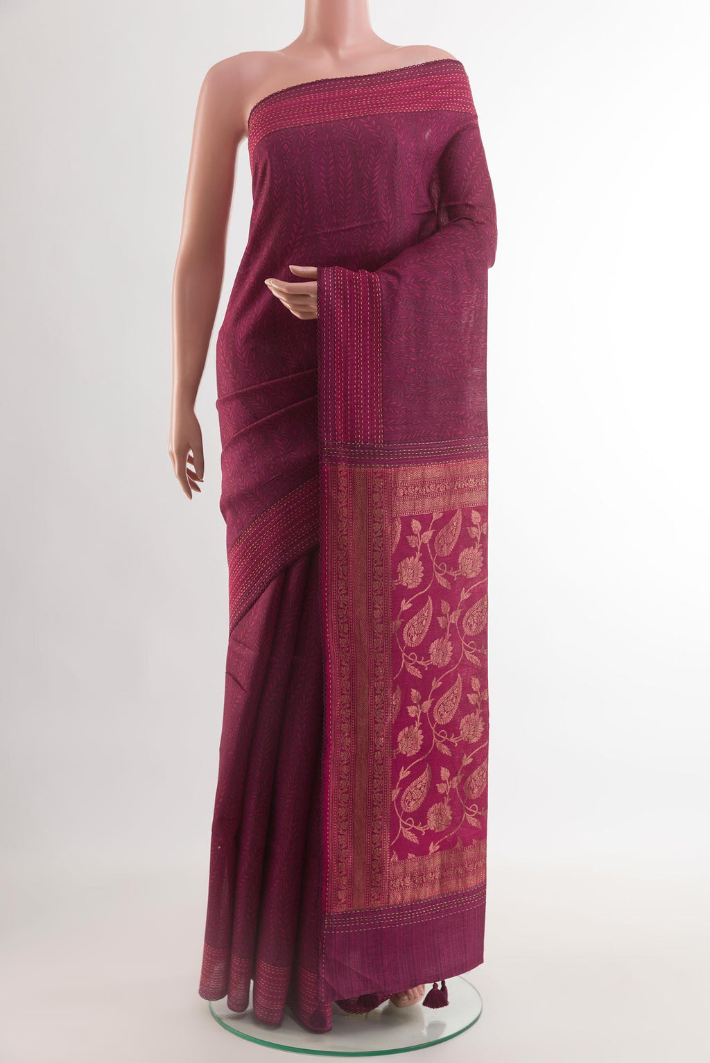 Maroon Tussar Silk Saree with Stripes on the body and Thread Border.  displayed on a mannequin