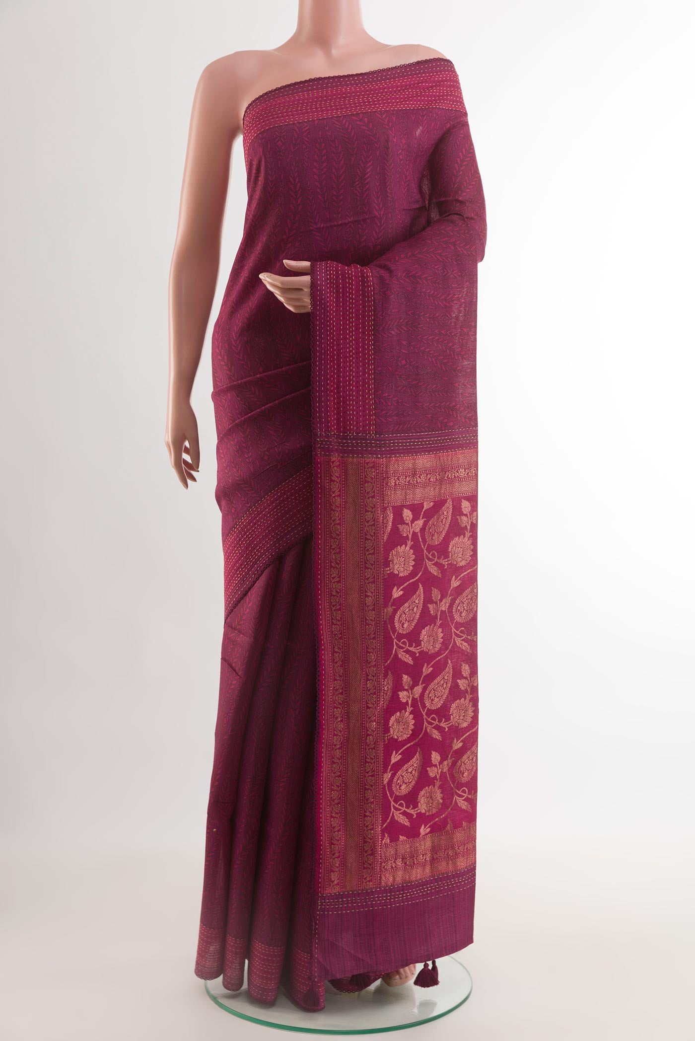 Maroon Tussar Silk Saree with Stripes on the body and Thread Border.  displayed on a mannequin
