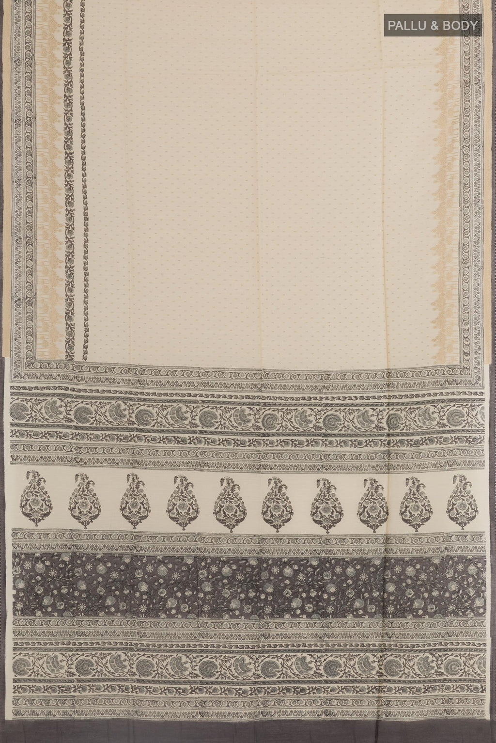 Flat view of Cream Tussar Silk Saree with Printed design on the body and Printed Border. 