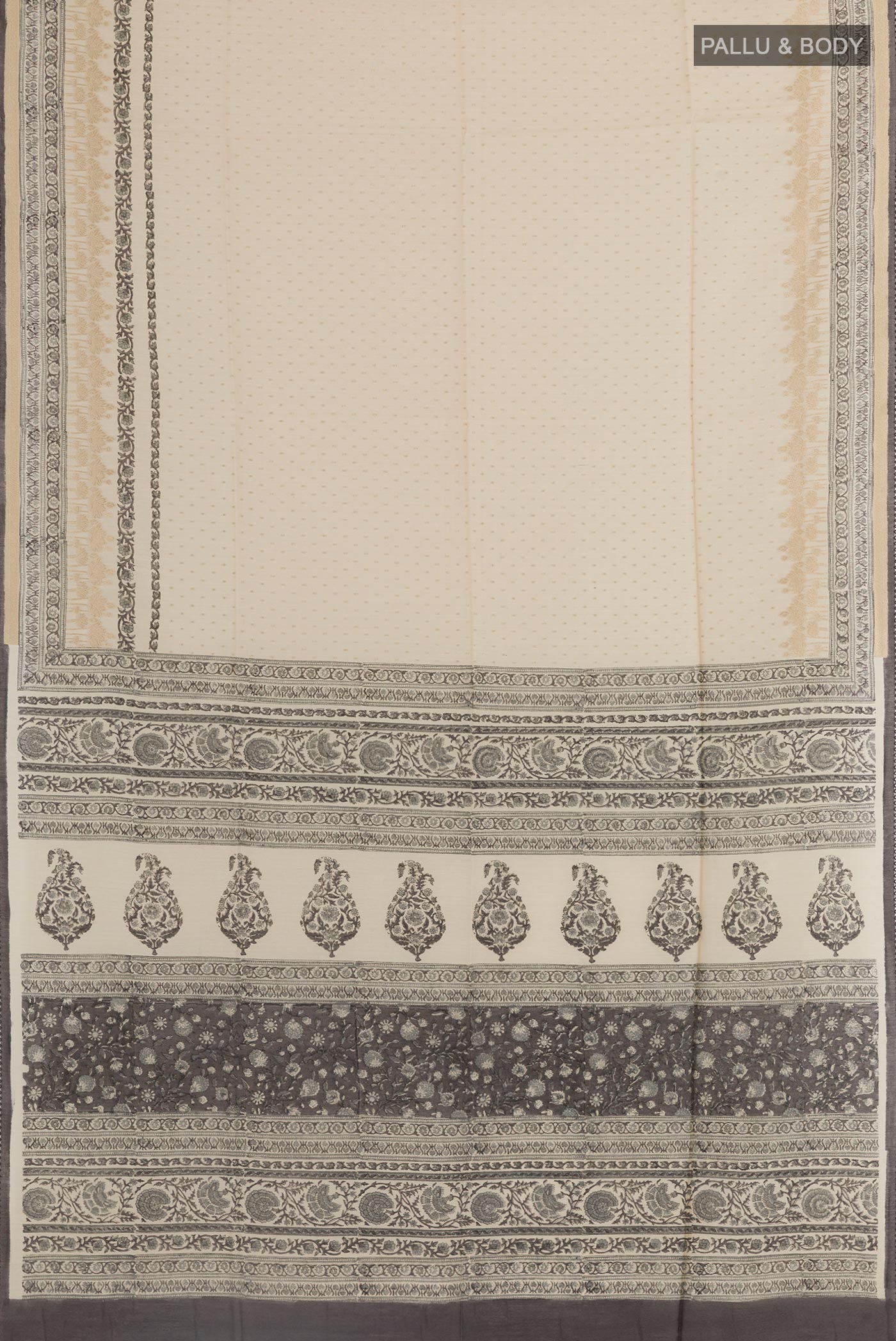 Flat view of Cream Tussar Silk Saree with Printed design on the body and Printed Border. 