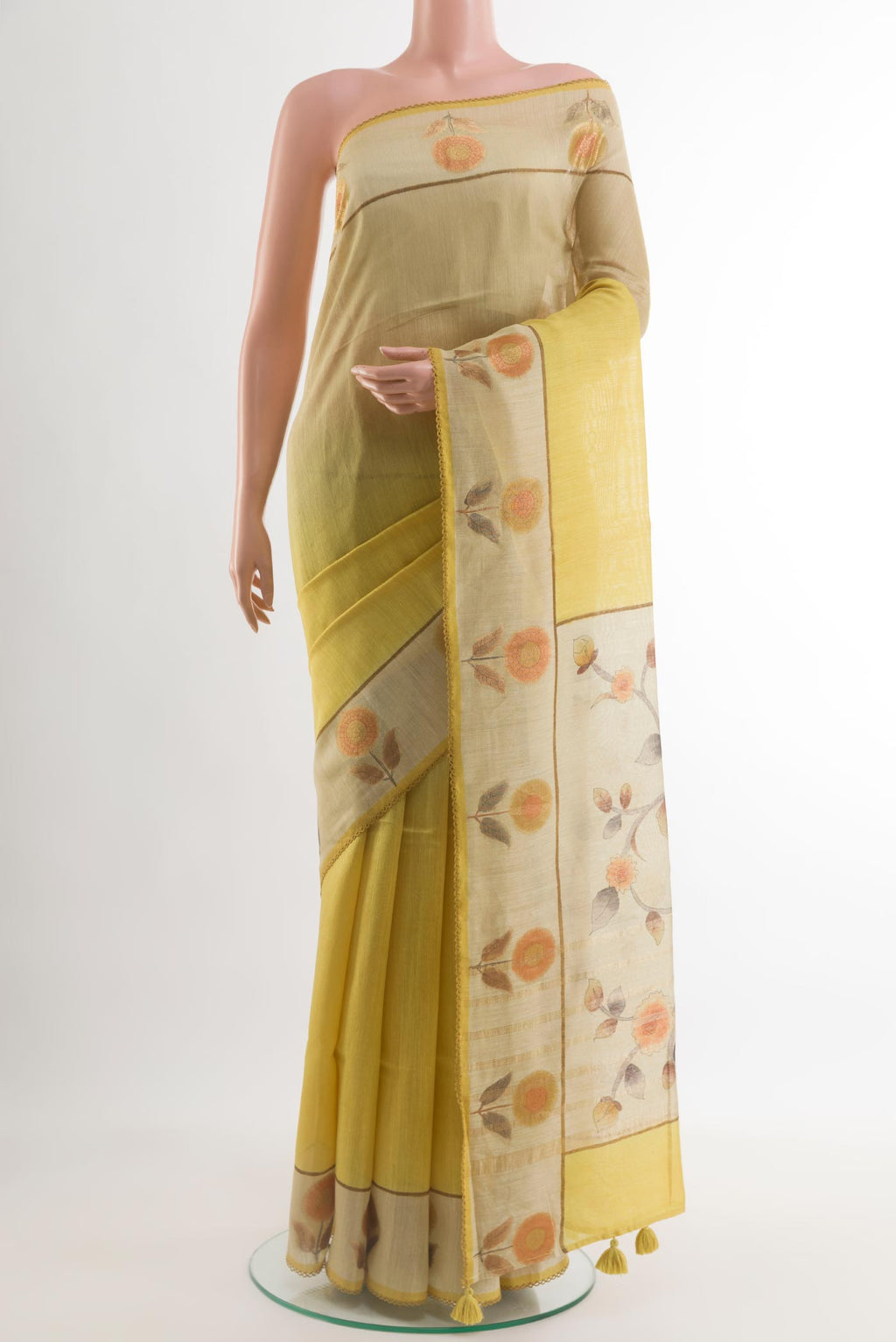 Multi Color Tussar Silk Saree with Printed design on the body and Printed Border.  displayed on a mannequin