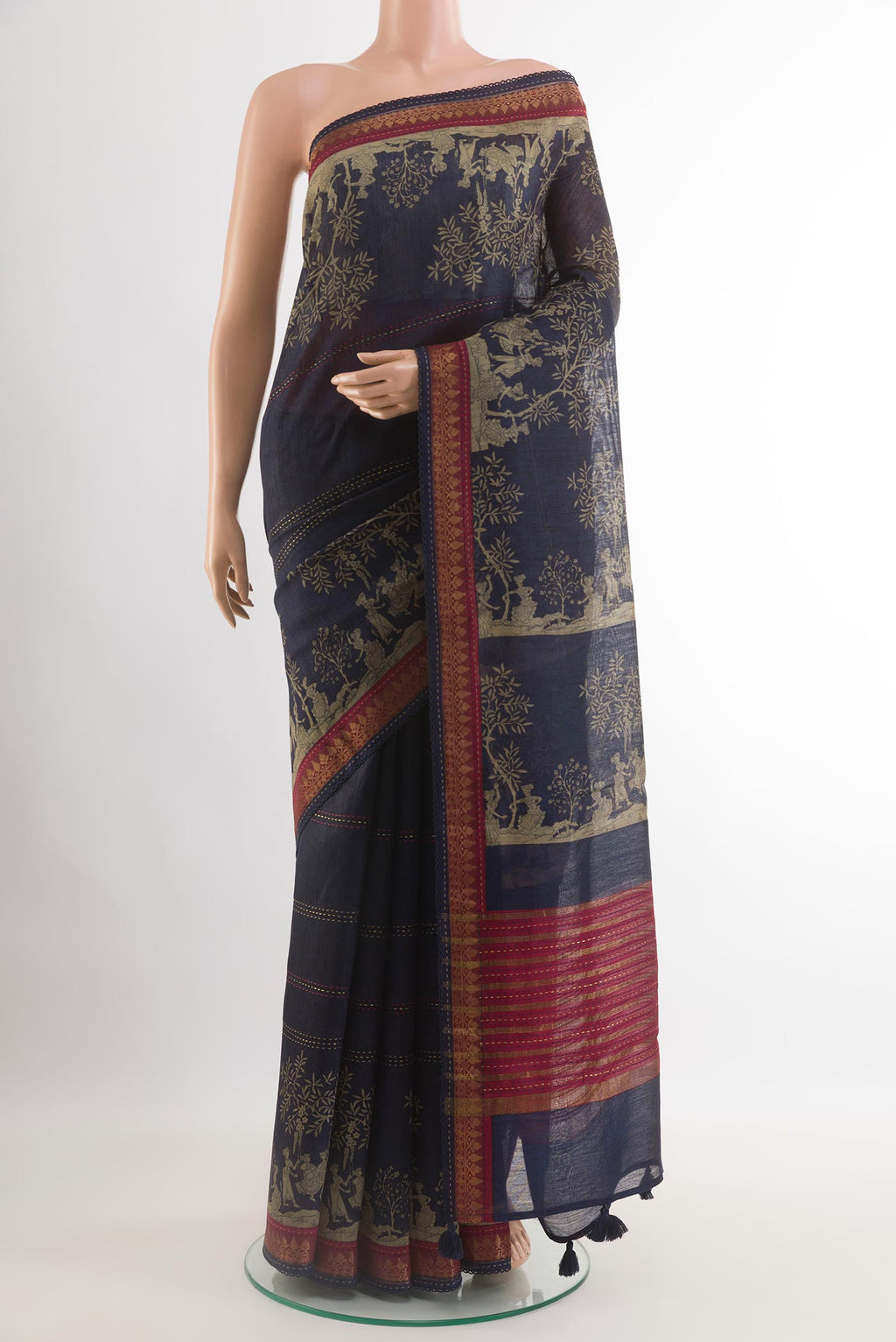 Blue Tussar Saree with Stripes on the body and Zari Border.  displayed on a mannequin
