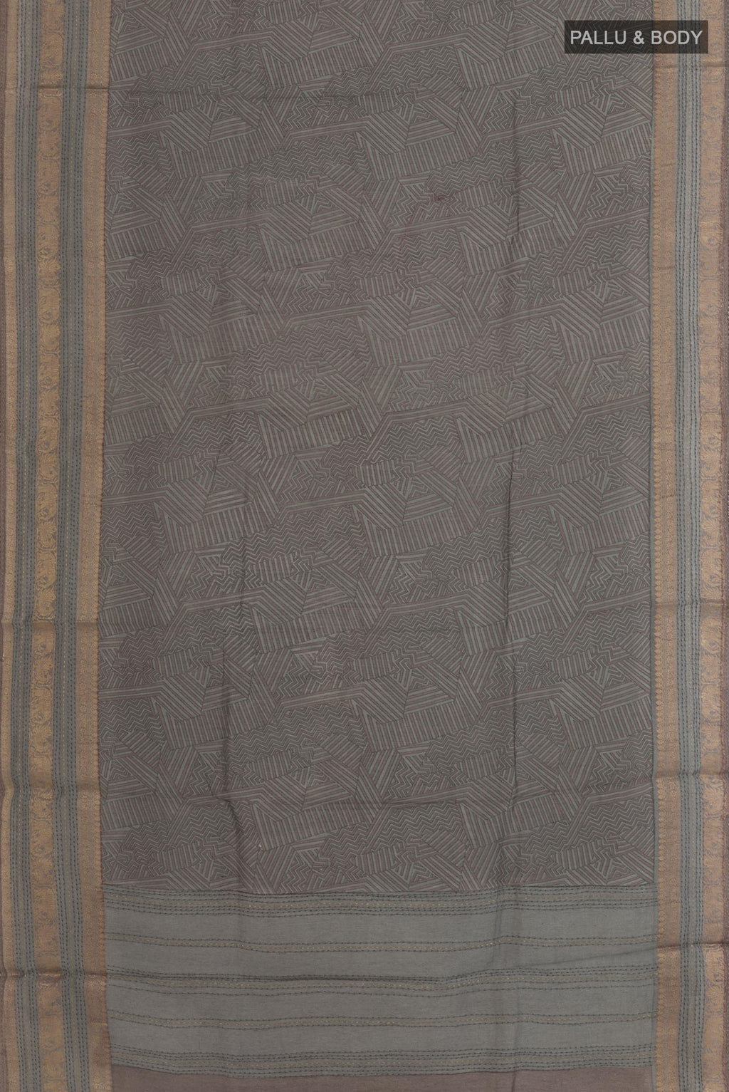 Flat view of Grey Tussar Silk Saree with Printed design on the body and Zari Border. 