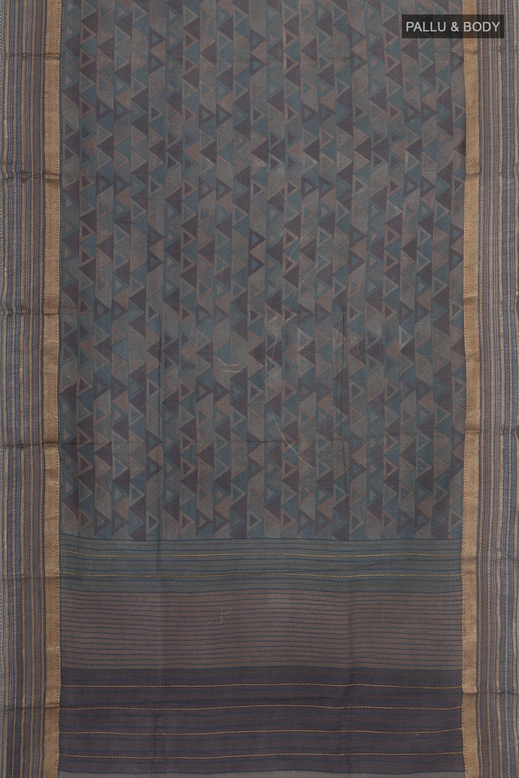 Flat view of Grey Tussar Saree with Printed design on the body and Zari Border. 