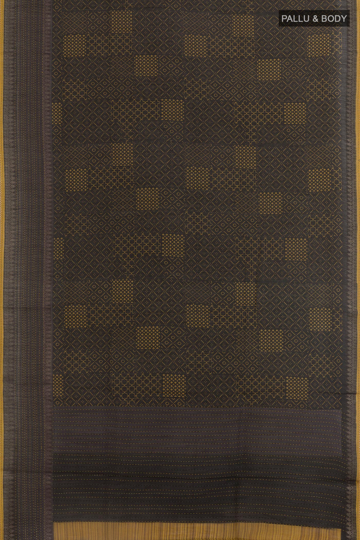 Flat view of Black Tussar Saree with Printed design on the body and Zari Border. 