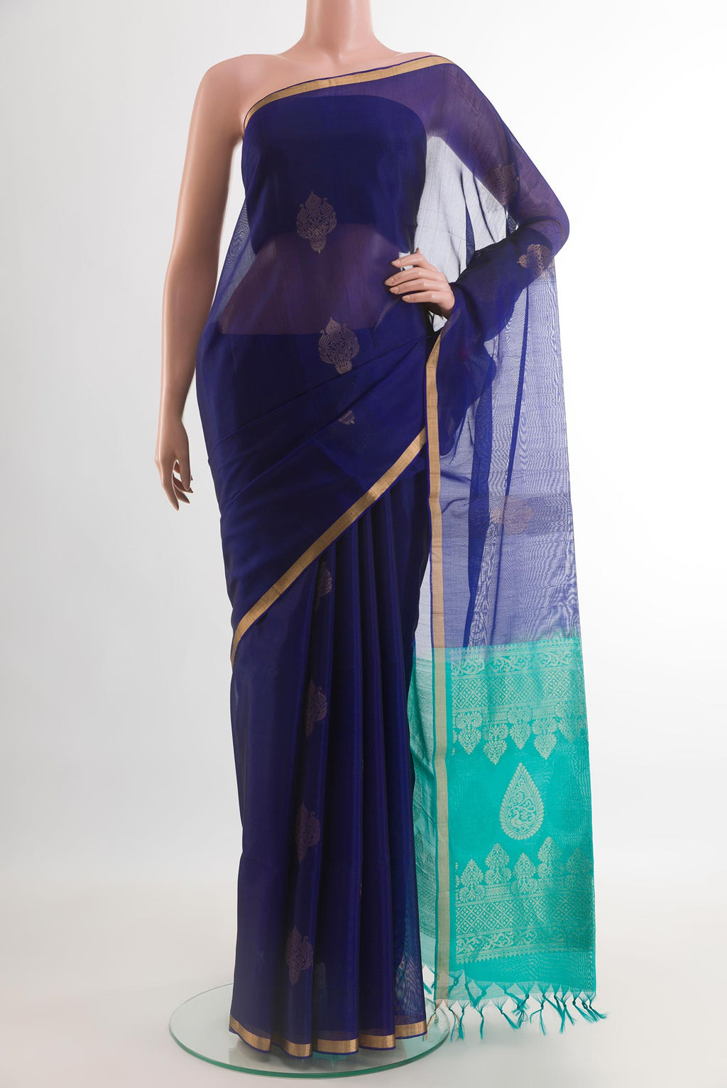Blue Silk Cotton Saree with Zari Butta on the body and Zari Border.  displayed on a mannequin
