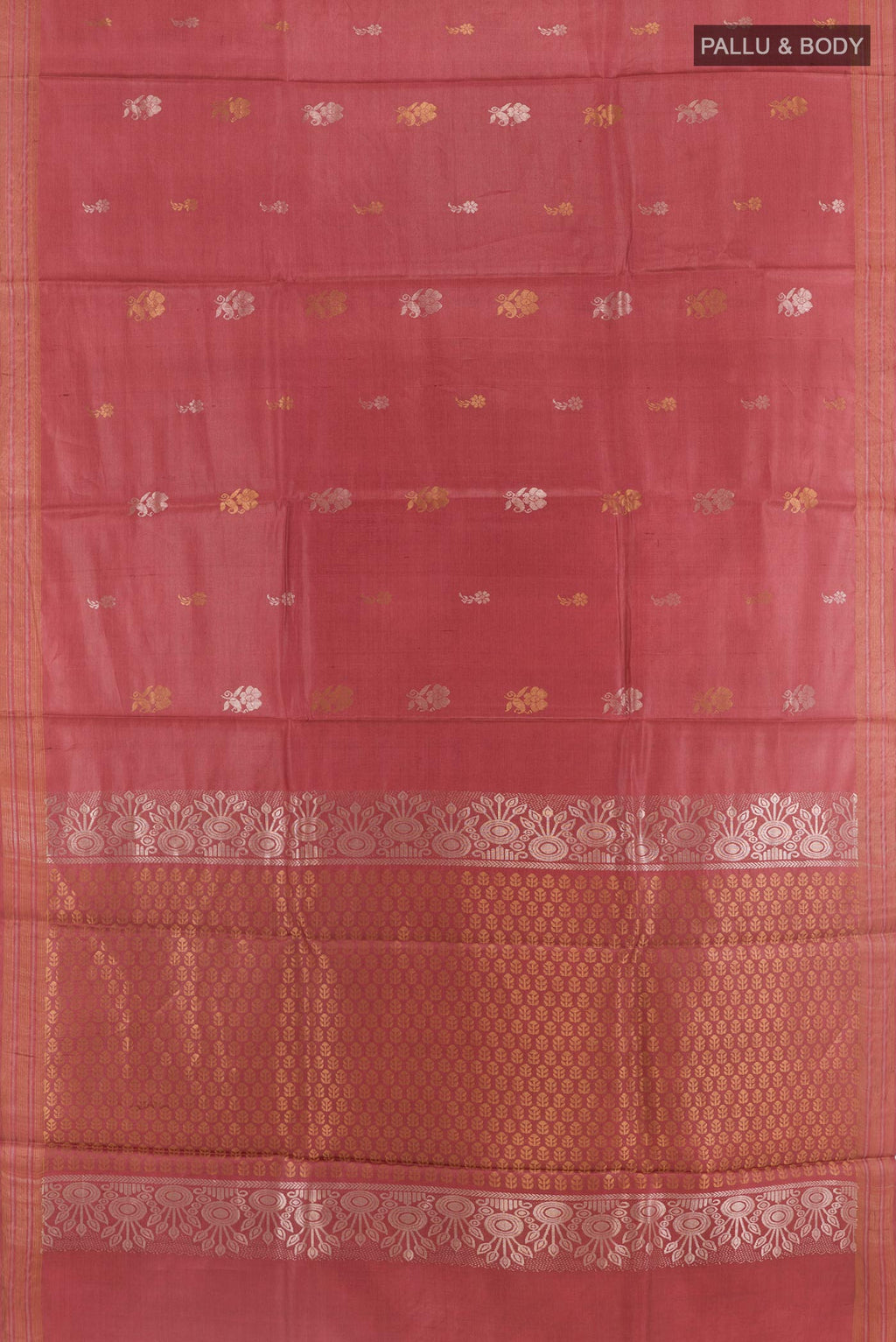 Flat view of Rust Tussar Silk Saree with Zari Butta on the body and Zari Border. 