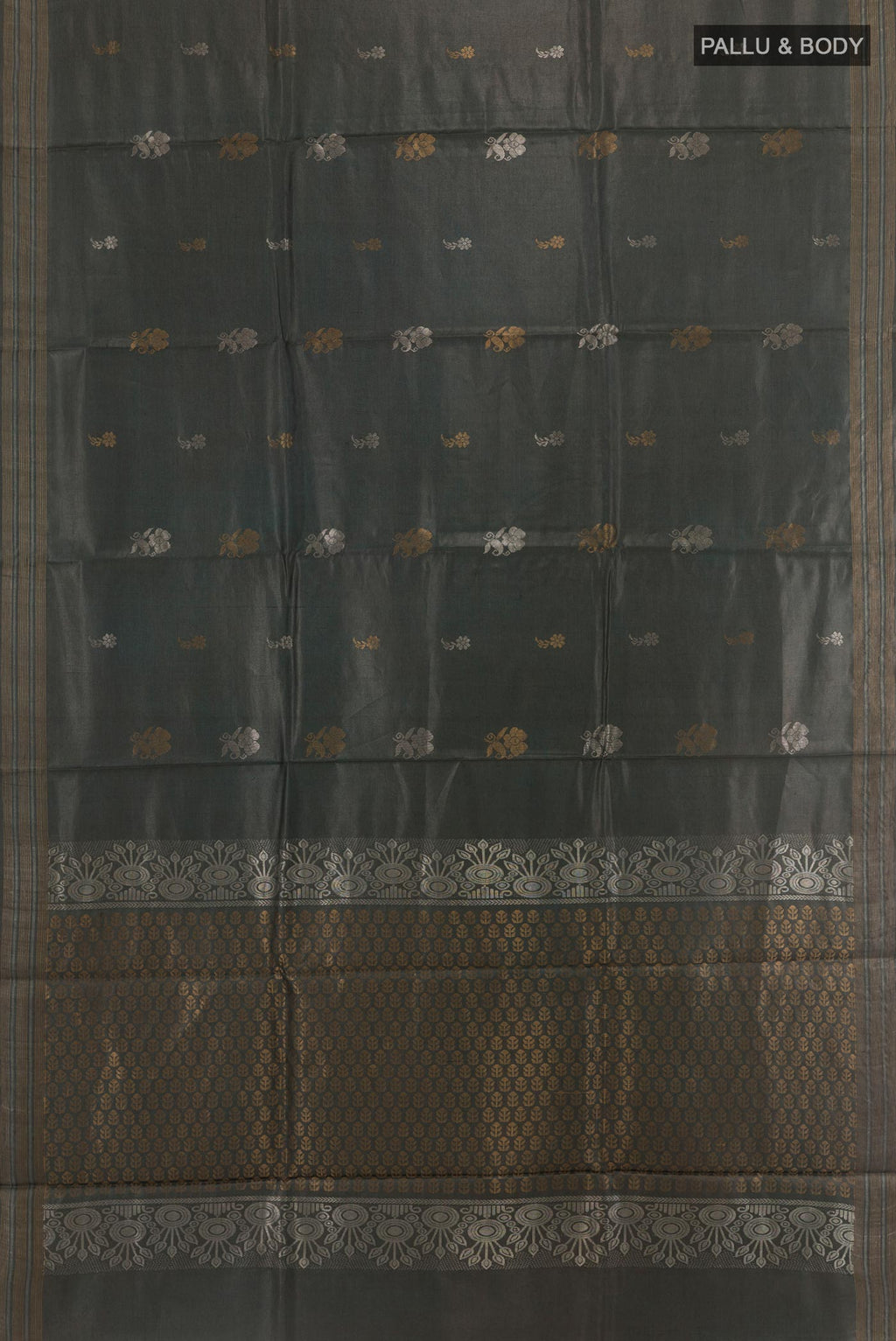 Flat view of Davys Grey Tussar Silk Saree with Zari Butta on the body and Zari Border. 