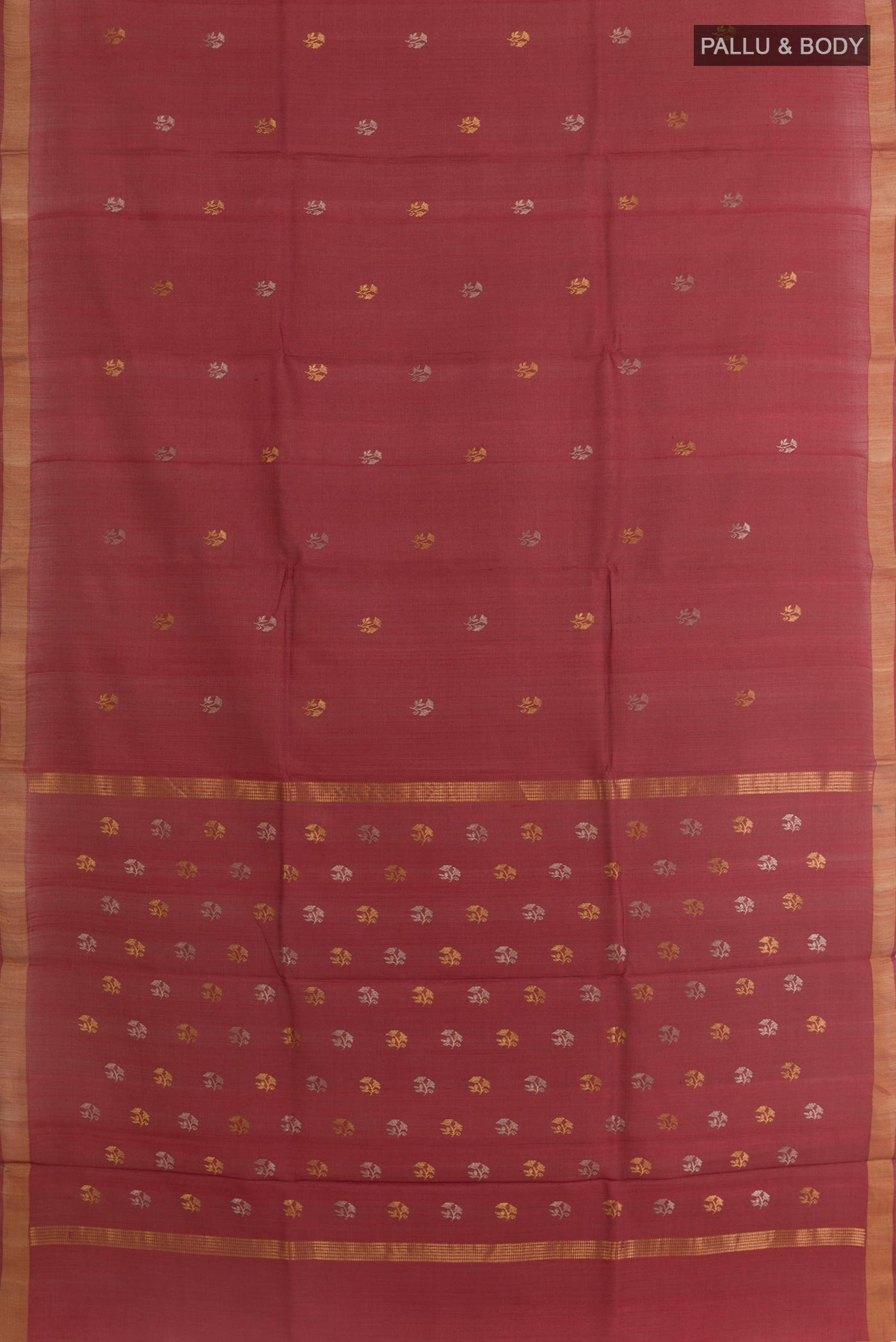 Flat view of Maroon Tussar Silk Saree with Zari Butta on the body and Zari Border. 