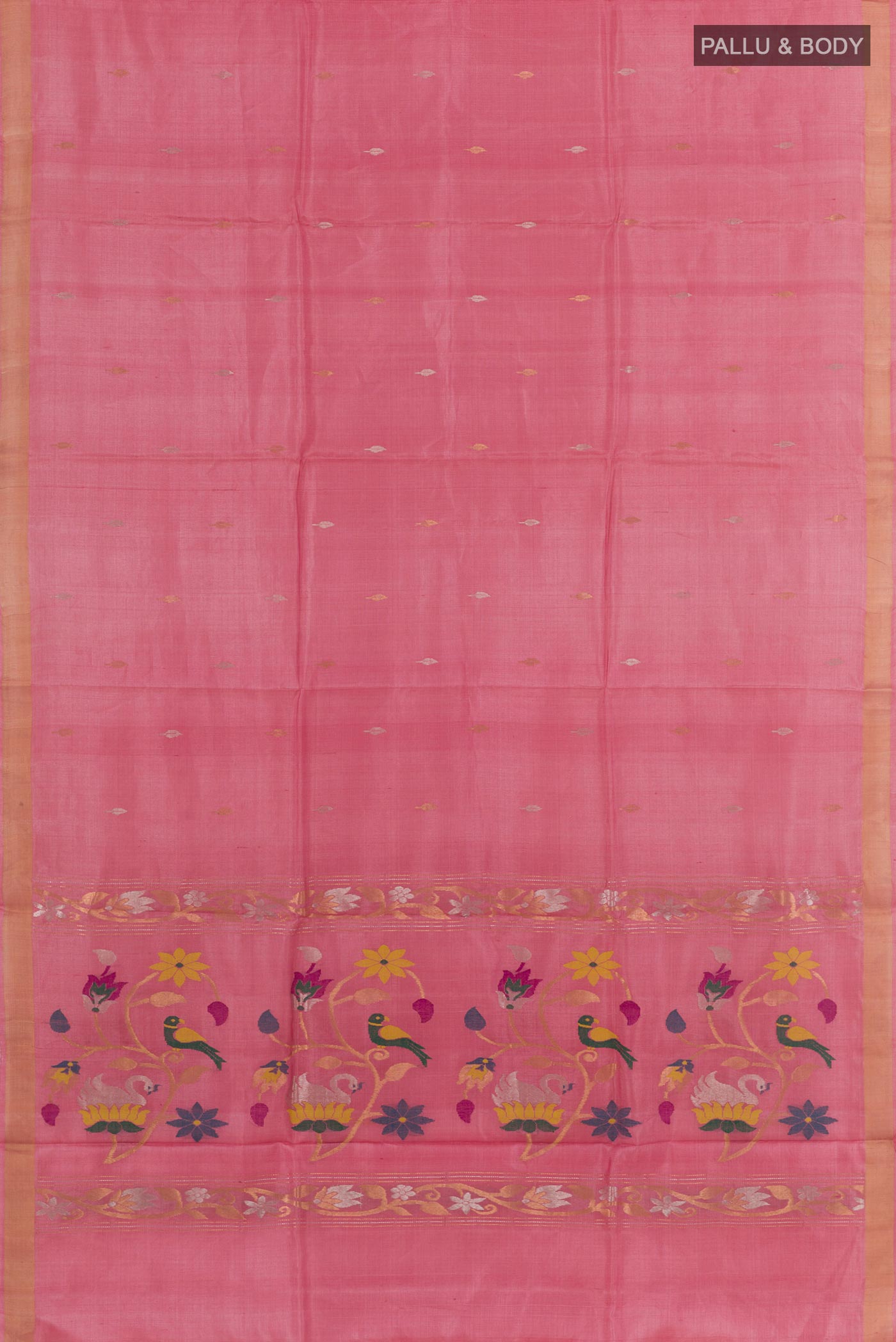 Flat view of Pink Tussar Saree with Zari Butta on the body and Zari Border. 