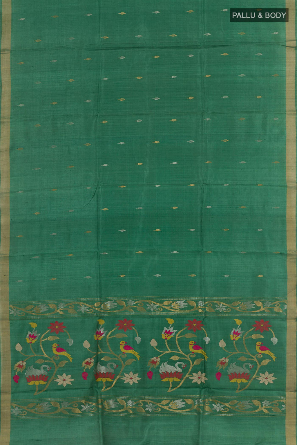 Flat view of Green Tussar Saree with Printed design on the body and Zari Border. 