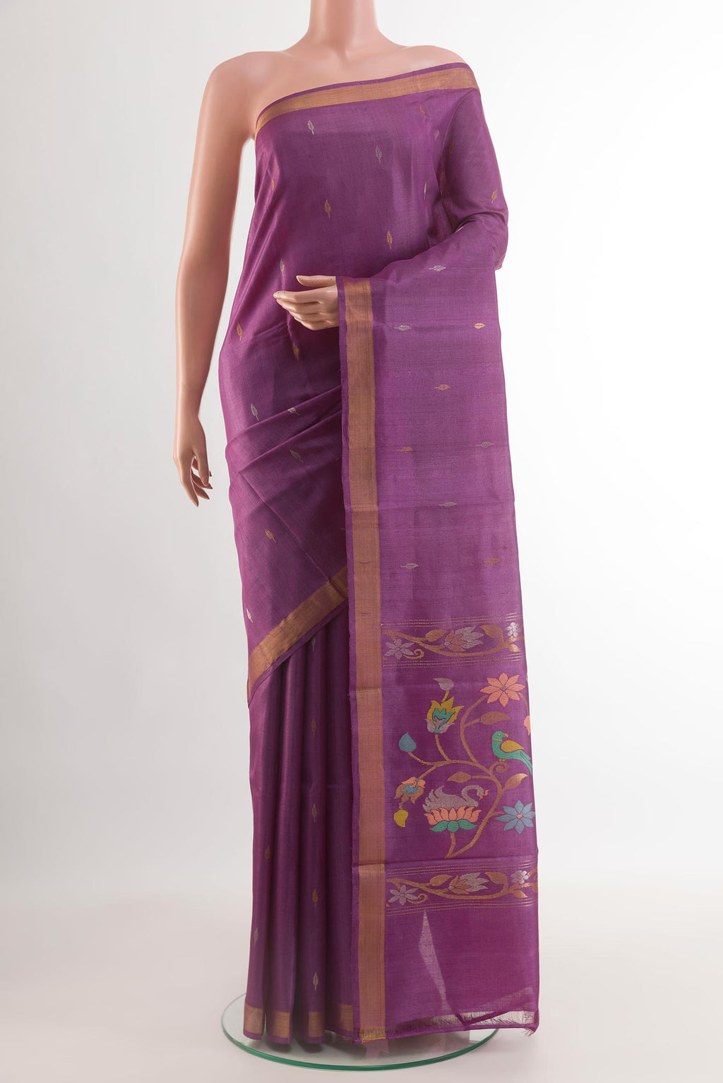 Purple Tussar Saree with Zari Butta on the body and Zari Border.  displayed on a mannequin