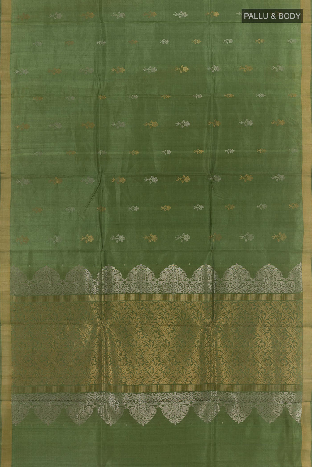 Flat view of Green Tussar Silk Saree with Zari Butta on the body and Zari Border. 