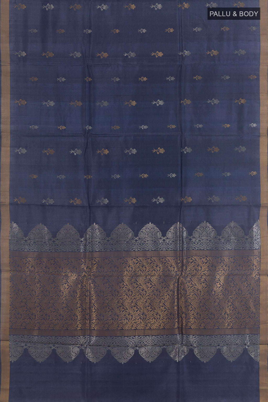 Flat view of Blue Tussar Silk Saree with Zari Butta on the body and Zari Border. 