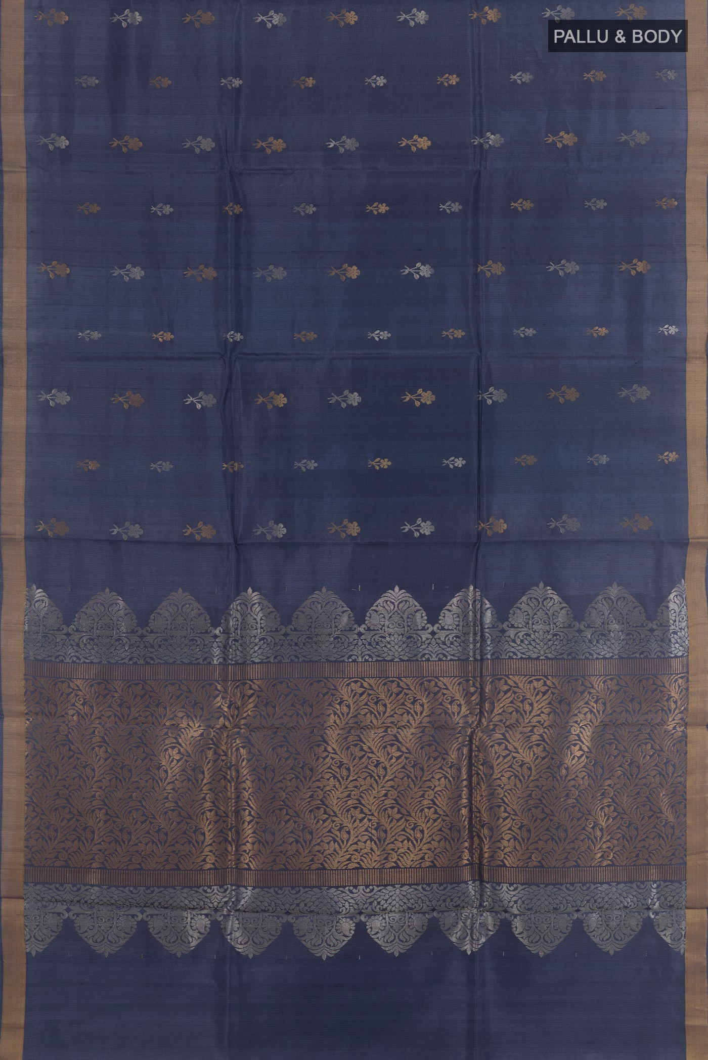 Flat view of Blue Tussar Silk Saree with Zari Butta on the body and Zari Border. 