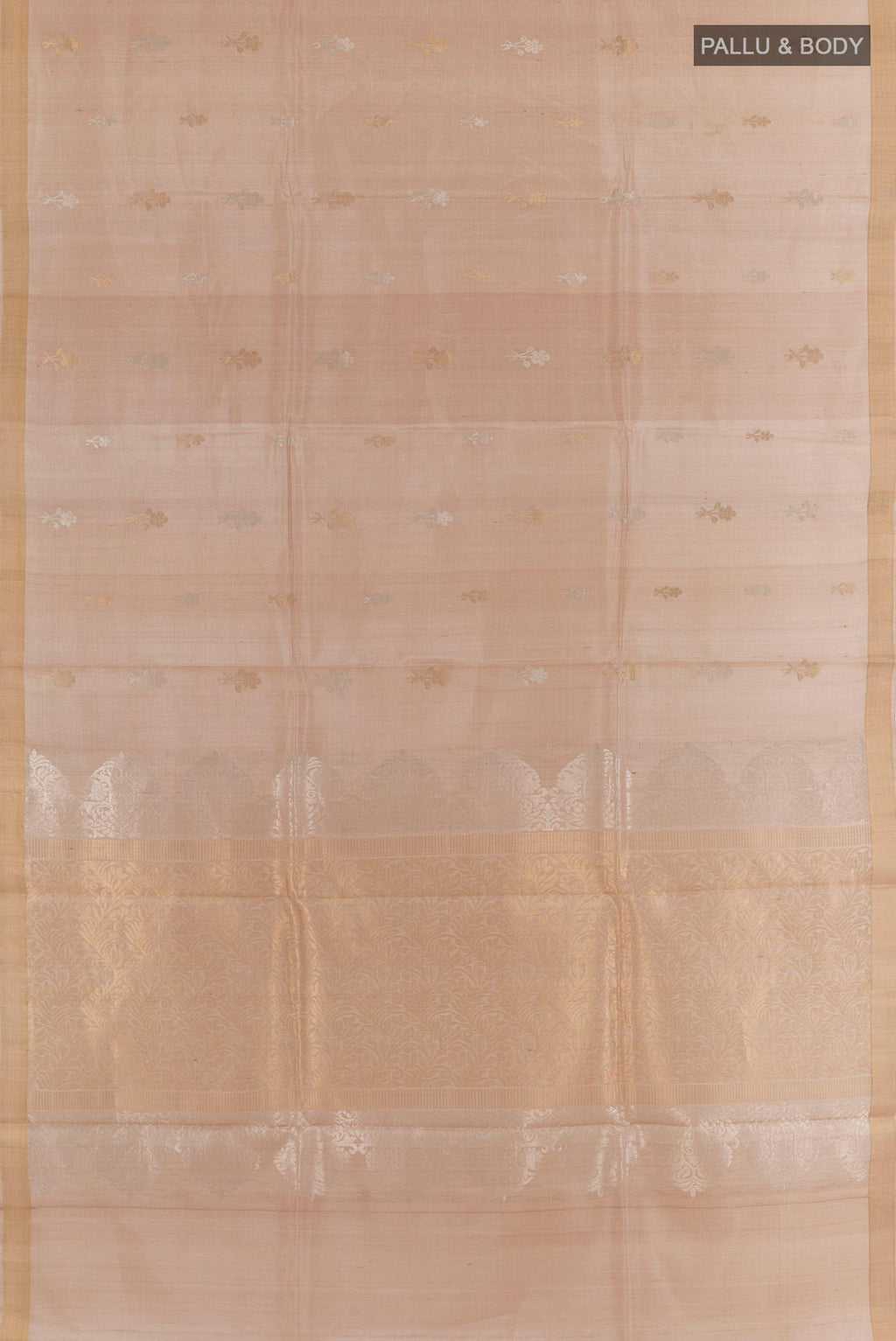 Flat view of Beige Tussar Silk Saree with Zari Butta on the body and Zari Border. 