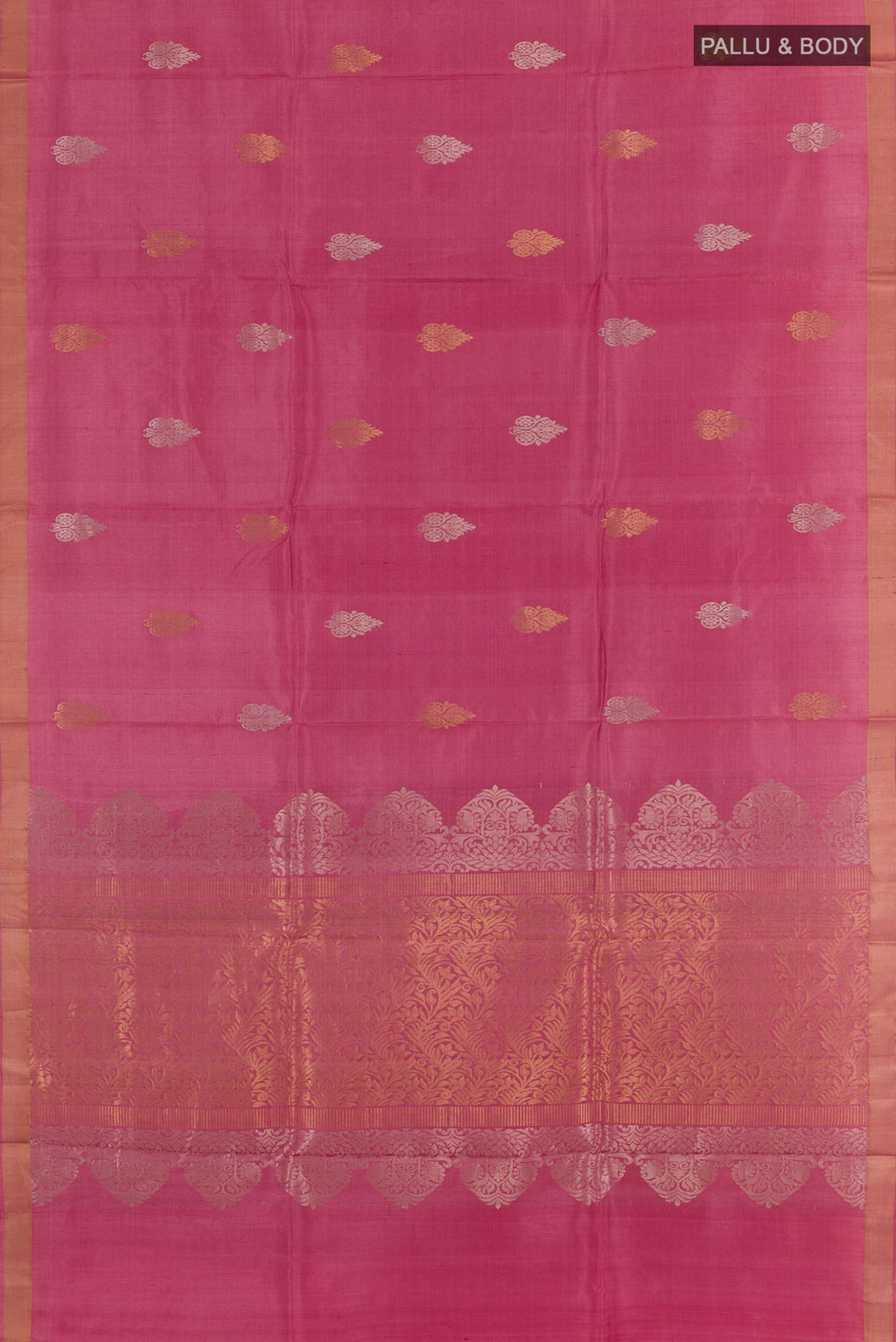 Flat view of Pink Tussar Silk Saree with Zari Butta on the body and Zari Border. 