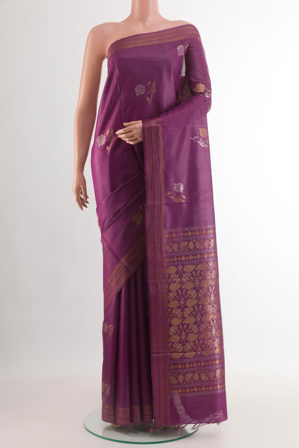 Purple Tussar Silk Saree with Zari Butta on the body and Zari Border.  displayed on a mannequin