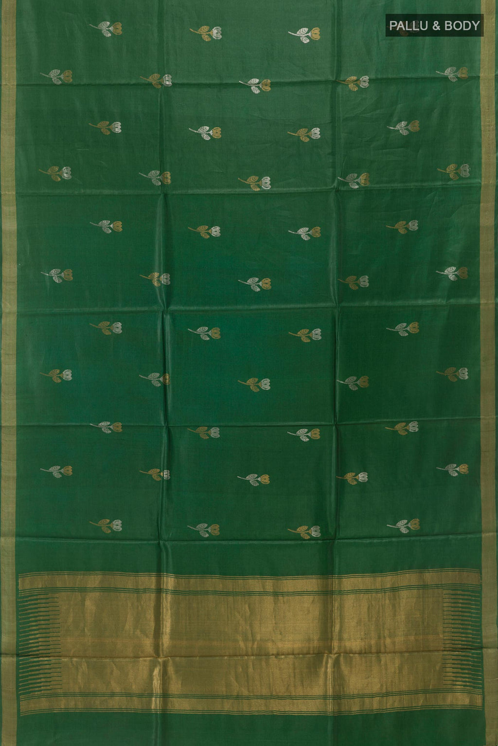 Flat view of Green Tussar Silk Saree with Zari Butta on the body and Zari Border. 