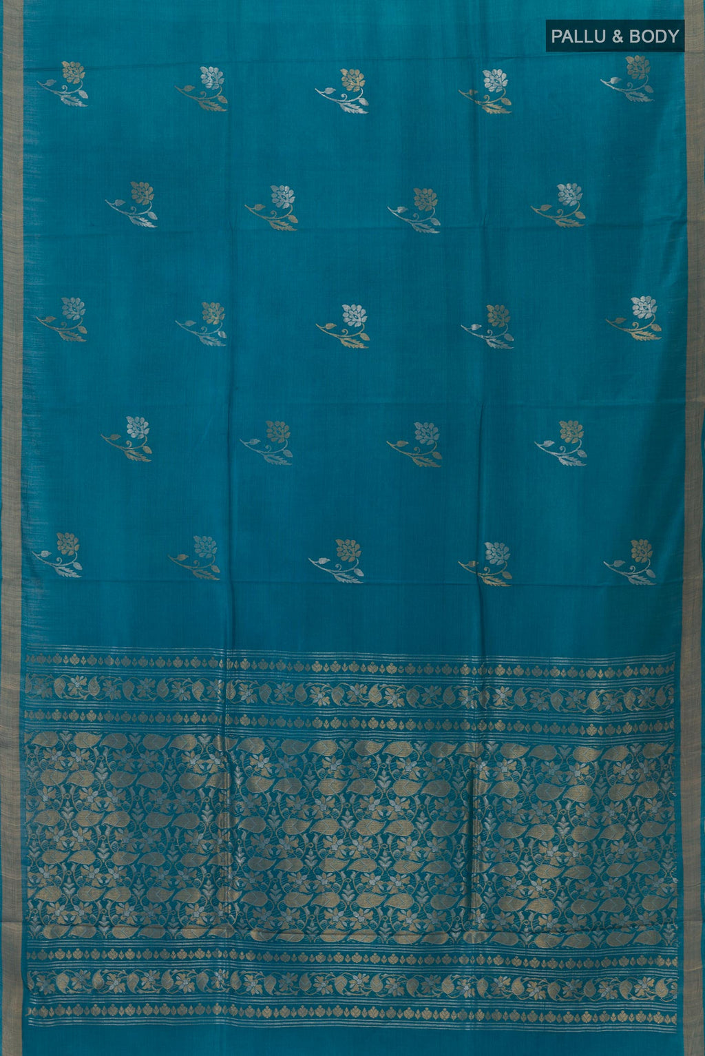 Flat view of Blue Tussar Silk Saree with Zari Butta on the body and Zari Border. 