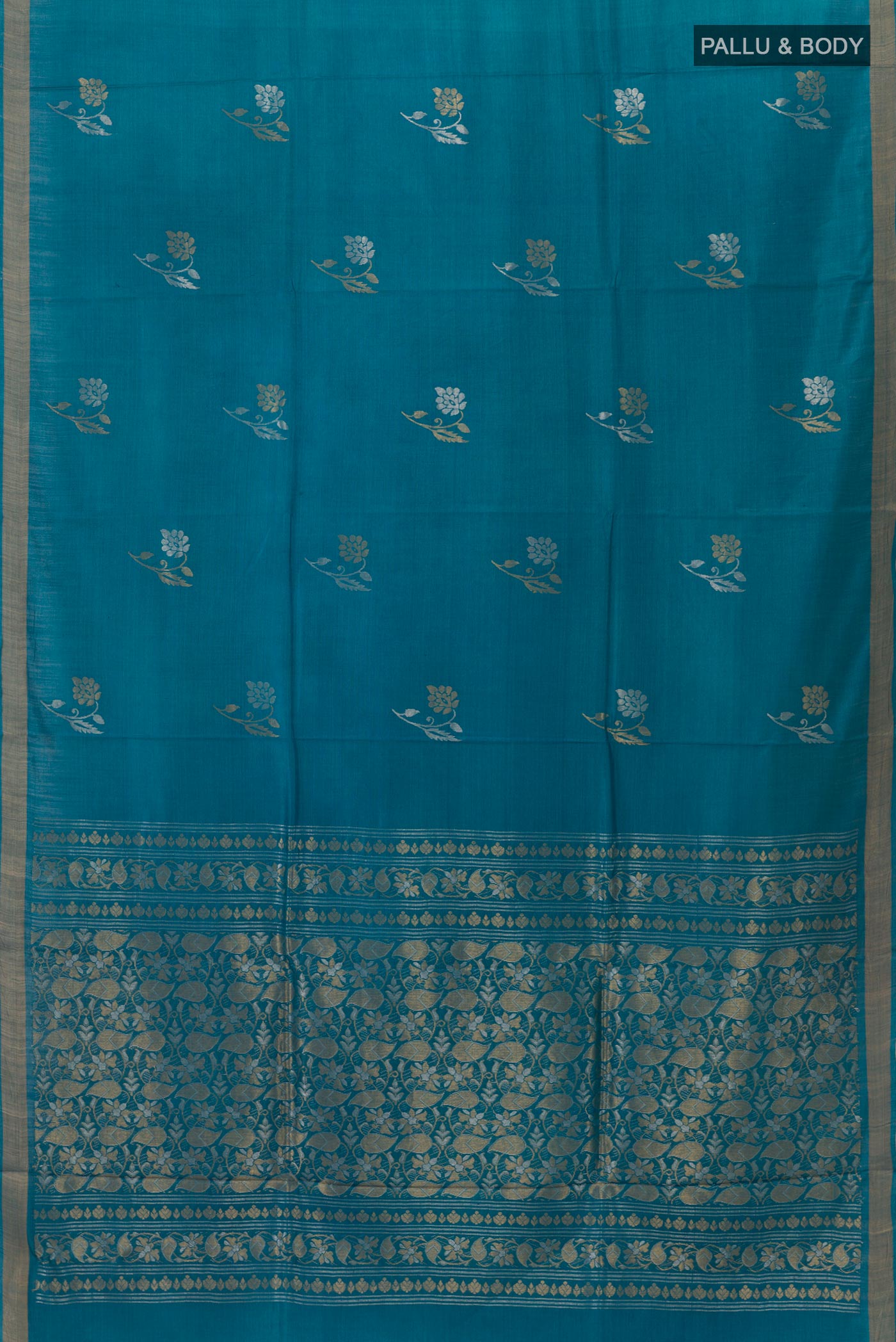 Flat view of Blue Tussar Silk Saree with Zari Butta on the body and Zari Border. 
