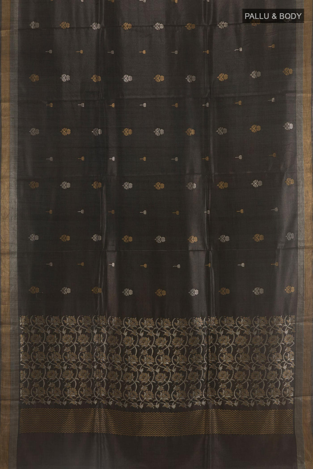 Flat view of Black Tussar Silk Saree with Zari Butta on the body and Zari Border. 