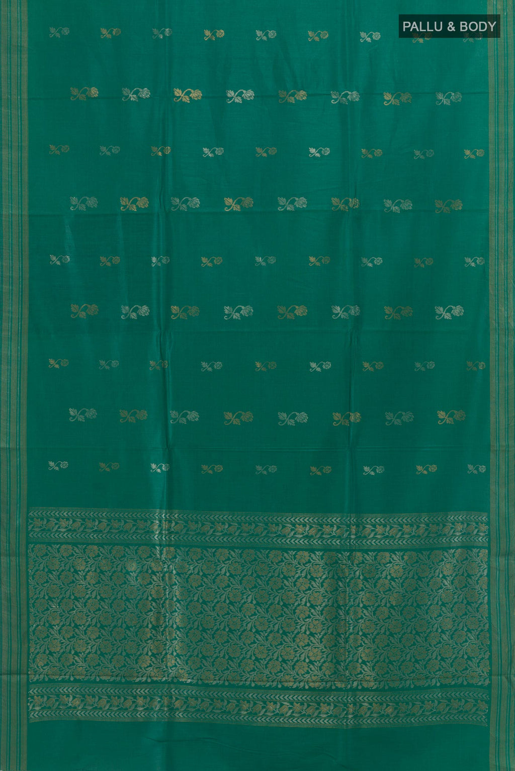 Flat view of Green Tussar Silk Saree with Zari Butta on the body and Zari Border. 