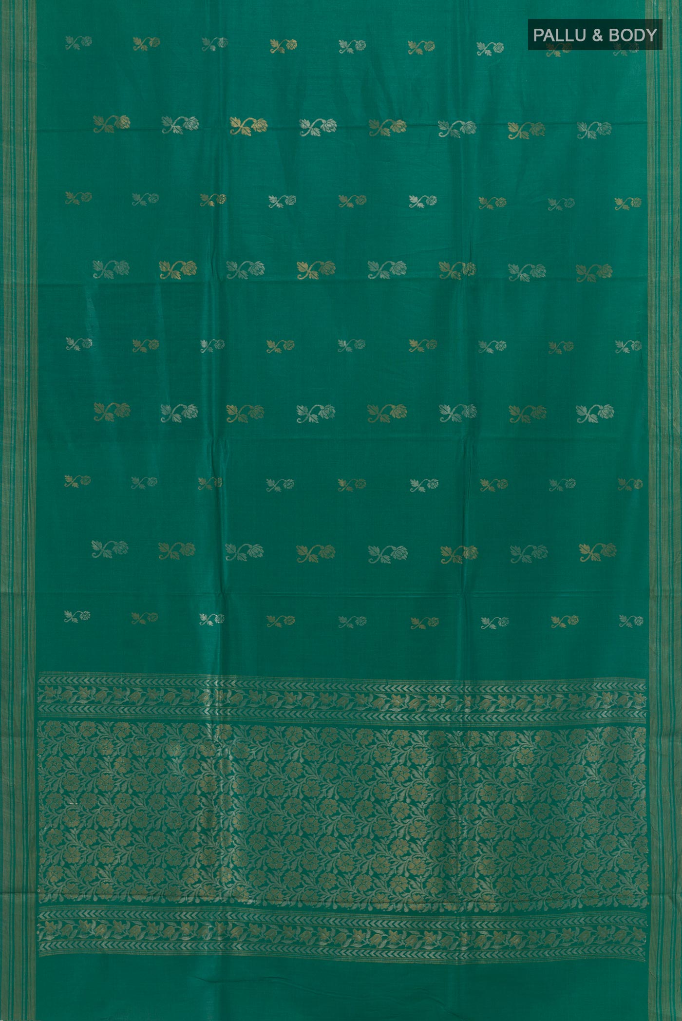 Flat view of Green Tussar Silk Saree with Zari Butta on the body and Zari Border. 