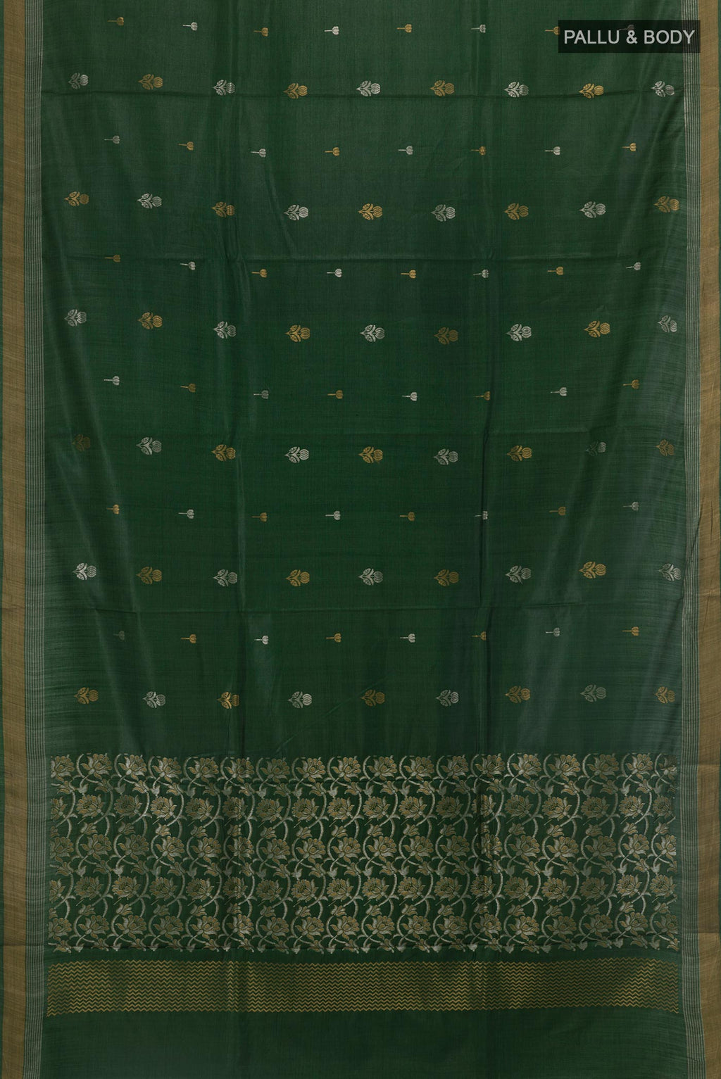 Flat view of Bottle Green Tussar Silk Saree with Zari Butta on the body and Zari Border. 