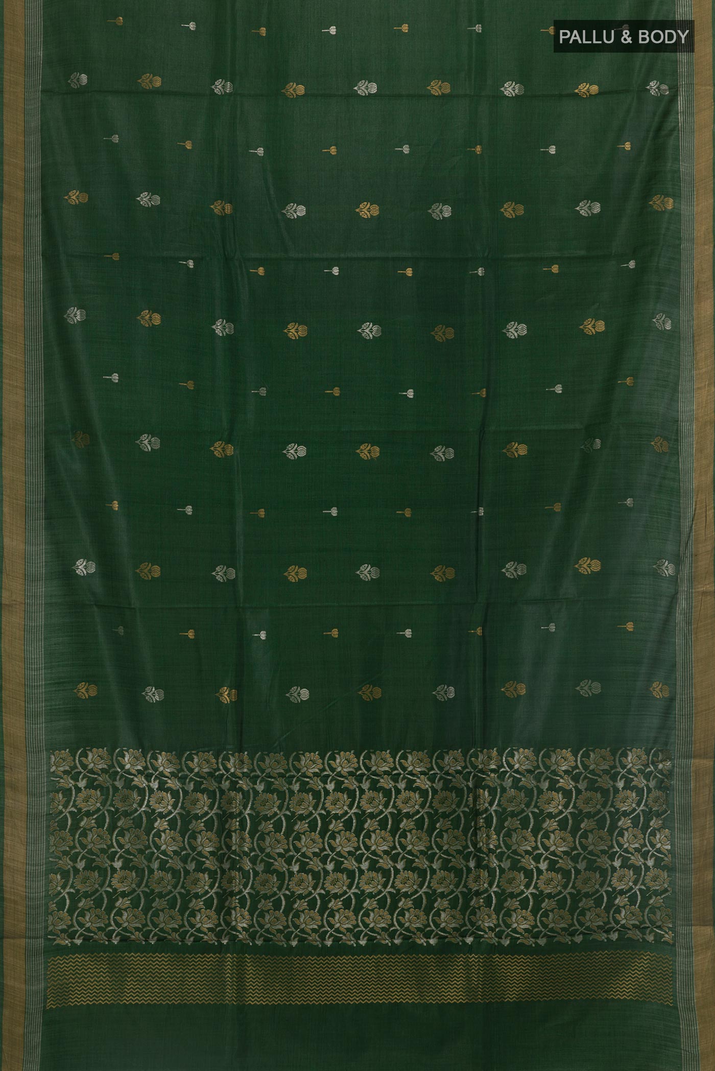 Flat view of Bottle Green Tussar Silk Saree with Zari Butta on the body and Zari Border. 