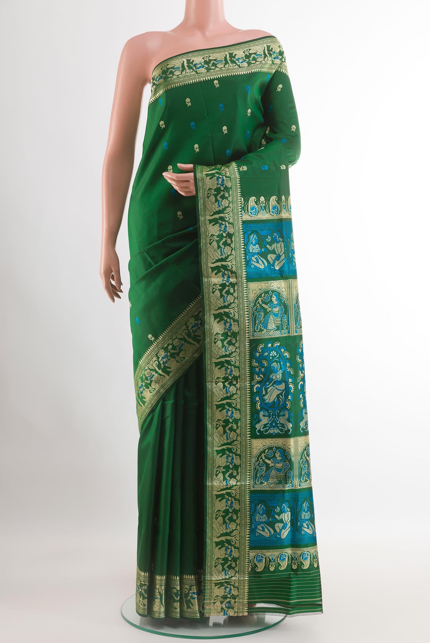 Green Baluchari Silk Saree with Zari Butta on the body and Zari Border.  displayed on a mannequin