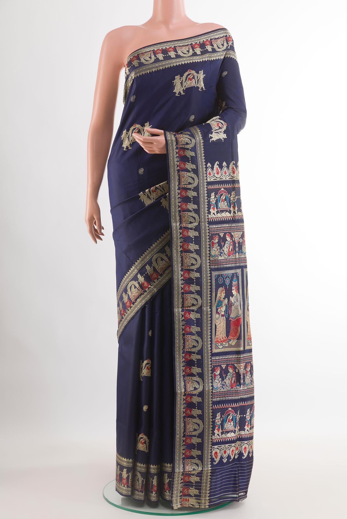 Dark Blue Baluchari Silk Saree with Zari Butta on the body and Zari Border.  displayed on a mannequin