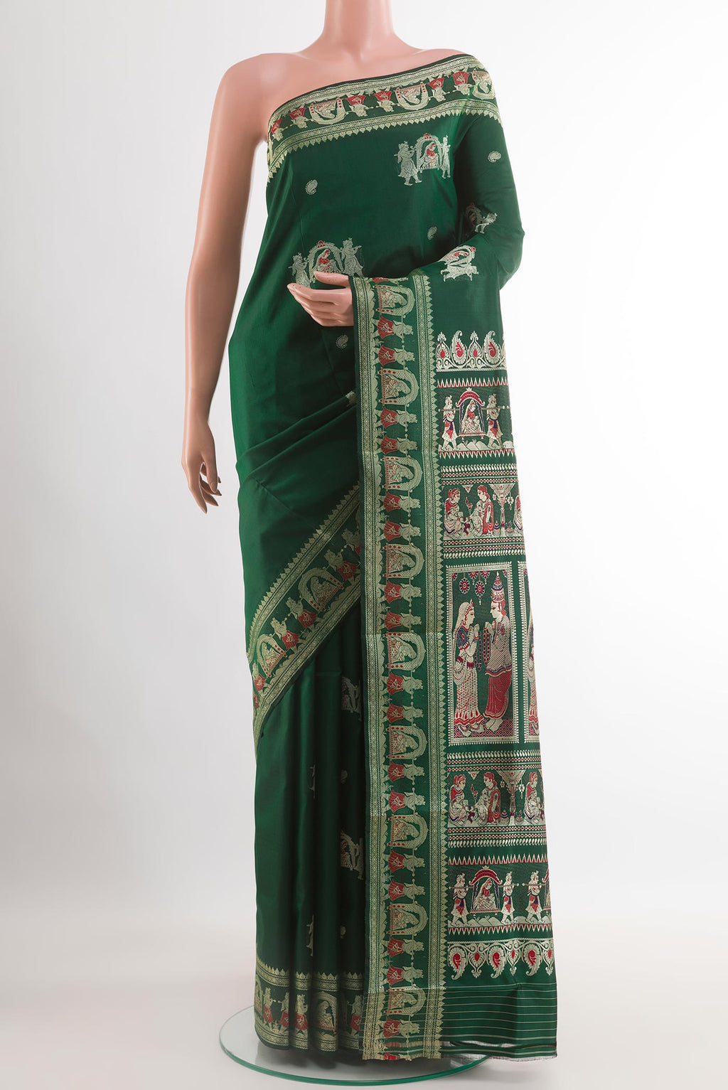 Green Baluchari Silk Saree with Zari Butta on the body and Zari Border.  displayed on a mannequin