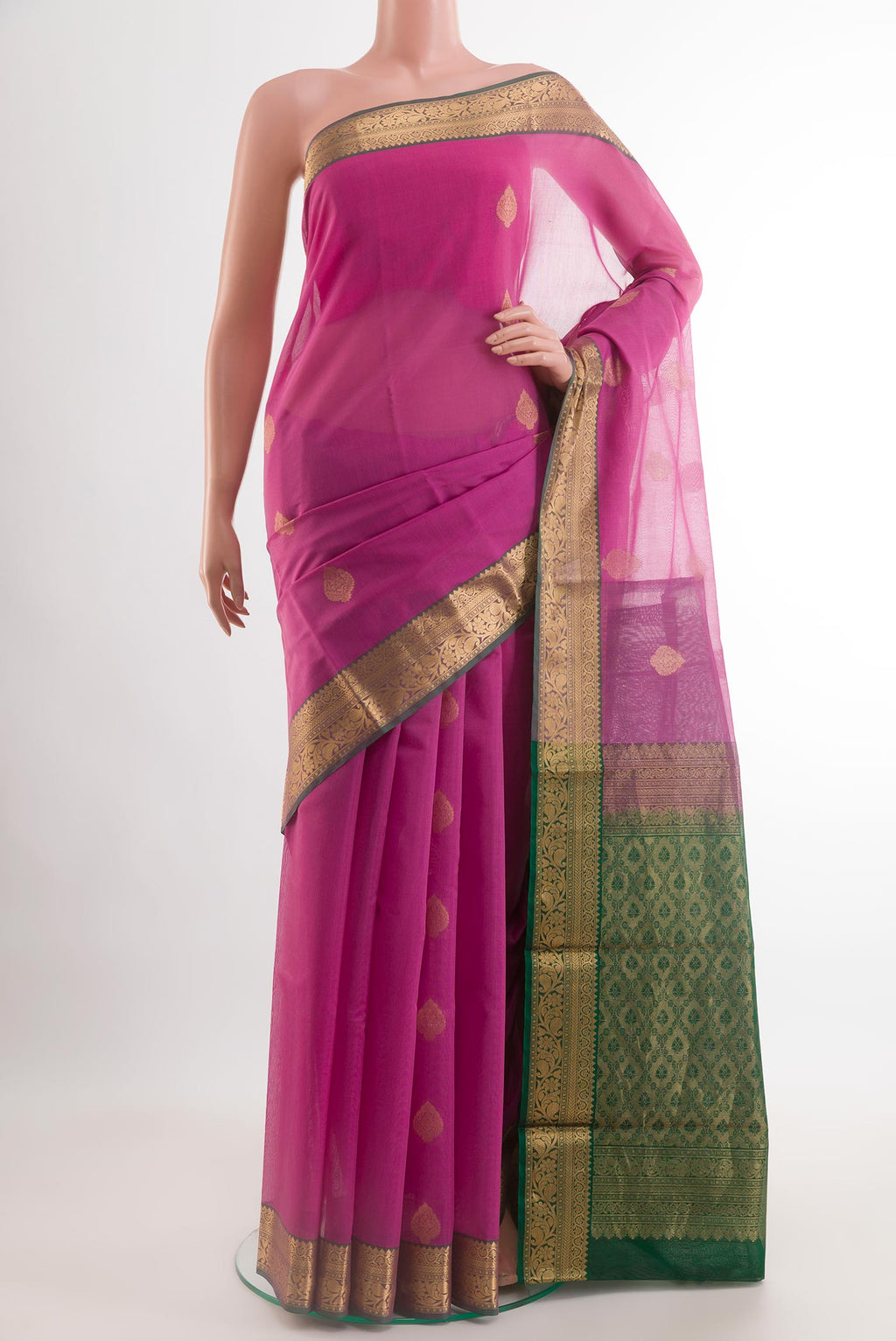 Pink Blended Kora Cotton Saree with Zari Butta on the body and Zari Border.  displayed on a mannequin