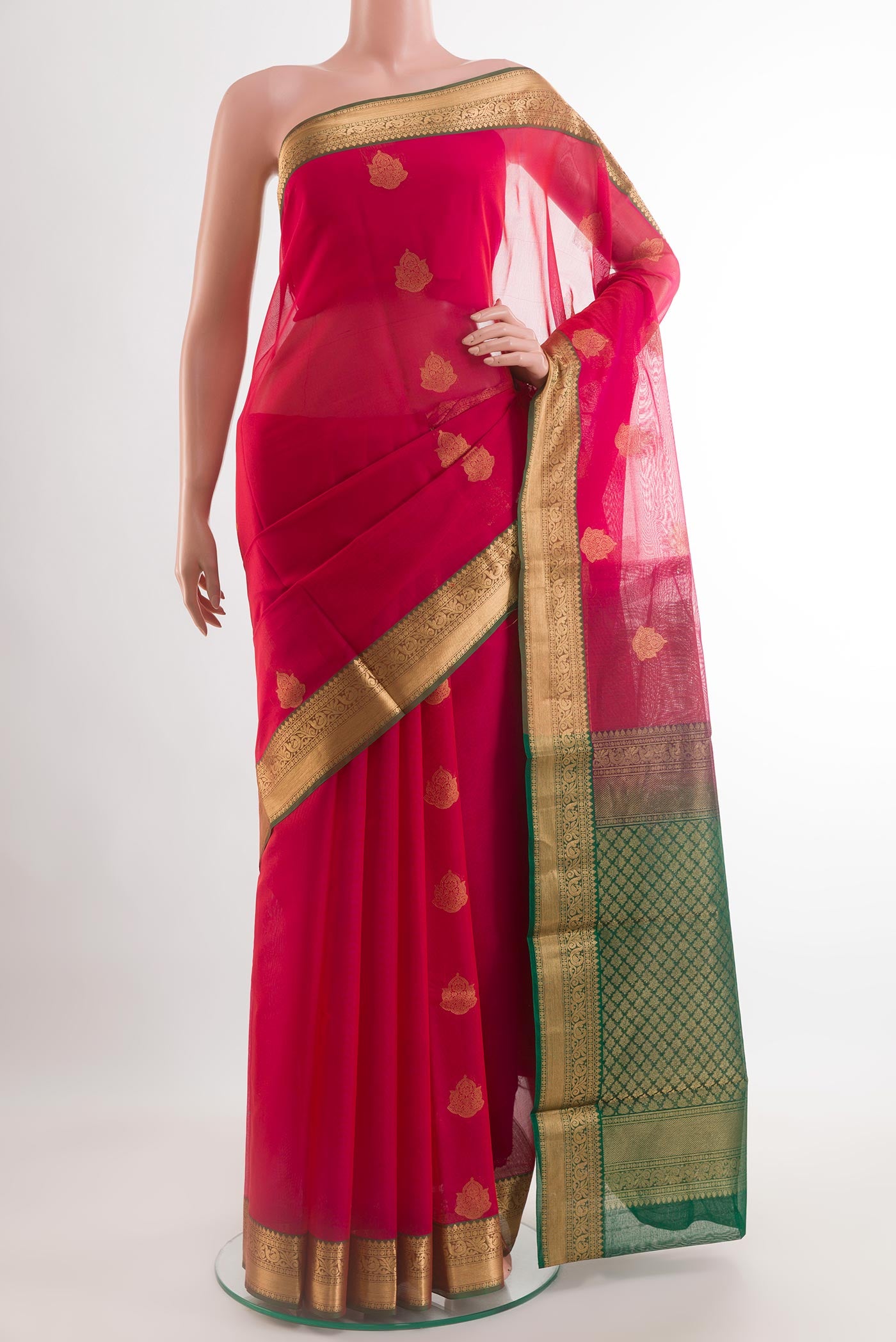 Pink Blended Kora Cotton Saree with Zari Butta on the body and Zari Border.  displayed on a mannequin