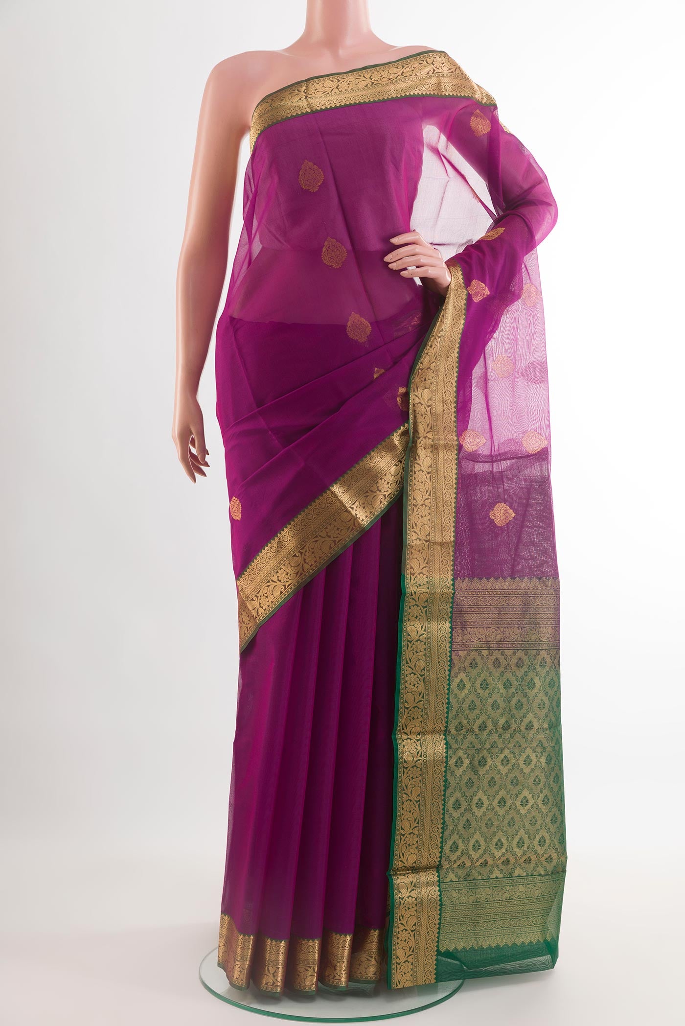 Purple Silk Cotton Saree with Zari Butta on the body and Zari Border.  displayed on a mannequin
