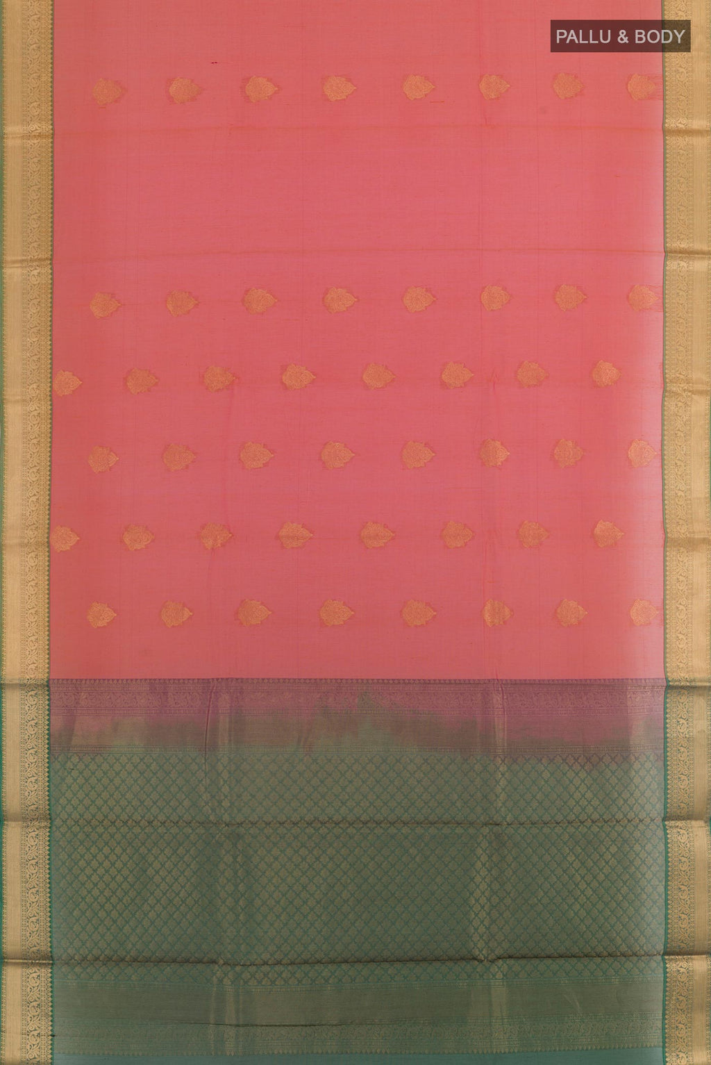 Flat view of Brick Orange Silk Cotton Saree with Zari Butta on the body and Zari Border. 