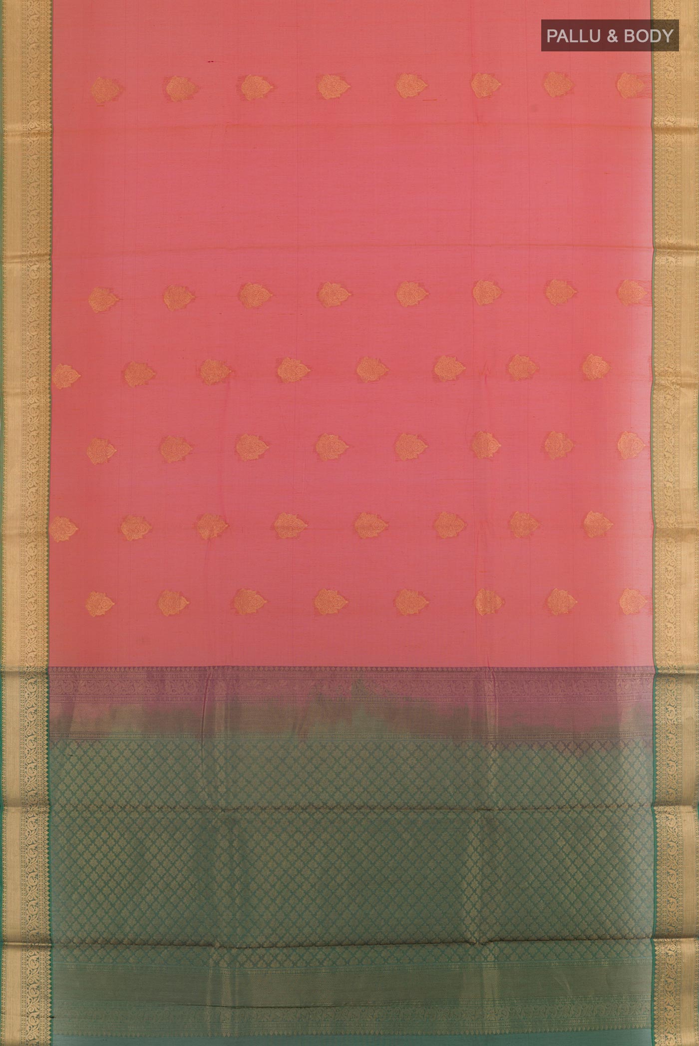 Flat view of Brick Orange Silk Cotton Saree with Zari Butta on the body and Zari Border. 