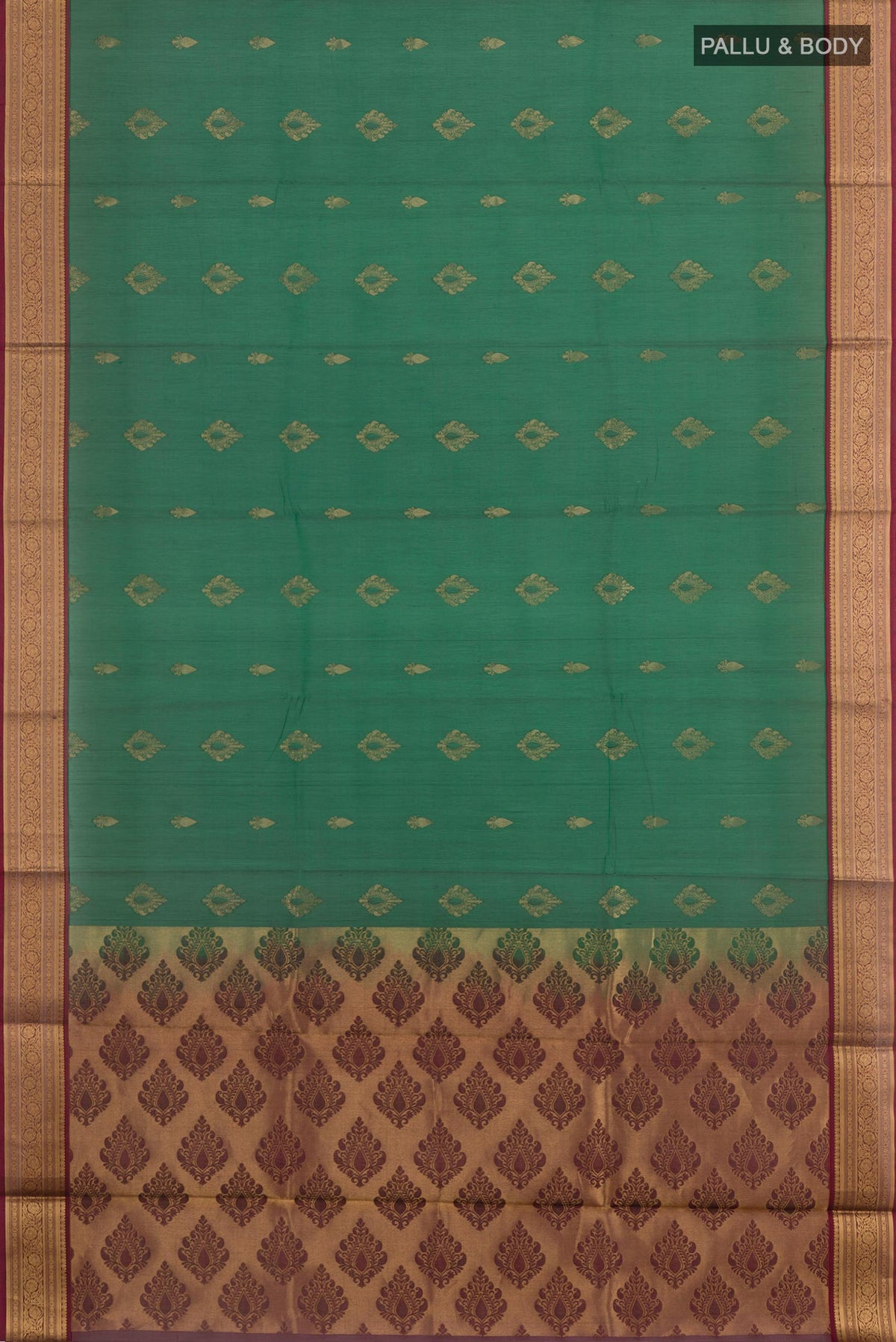 Flat view of Green Blended Kora Cotton Saree with Zari Butta on the body and Zari Border. 