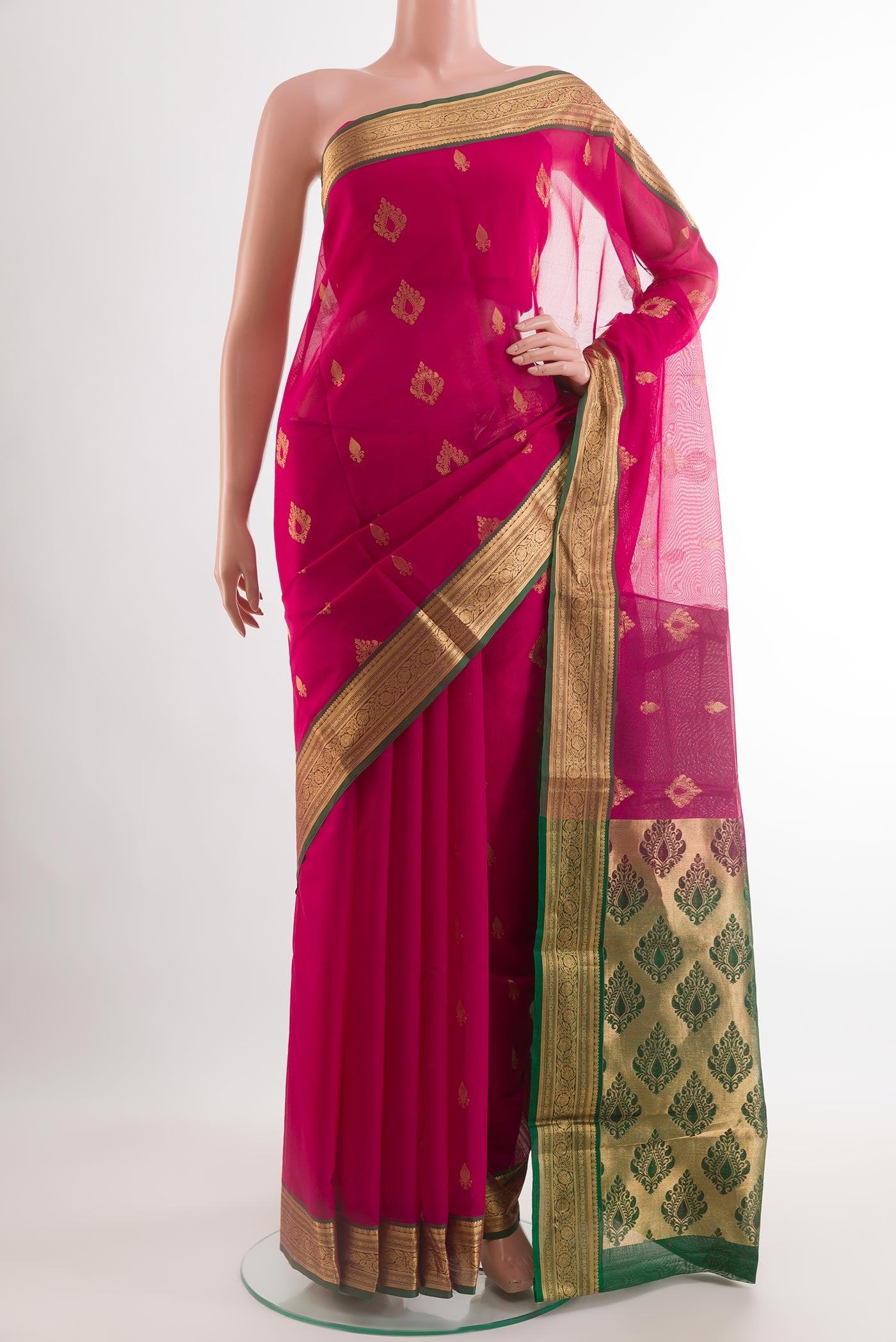 Pink Blended Kora Cotton Saree with Zari Butta on the body and Zari Border.  displayed on a mannequin