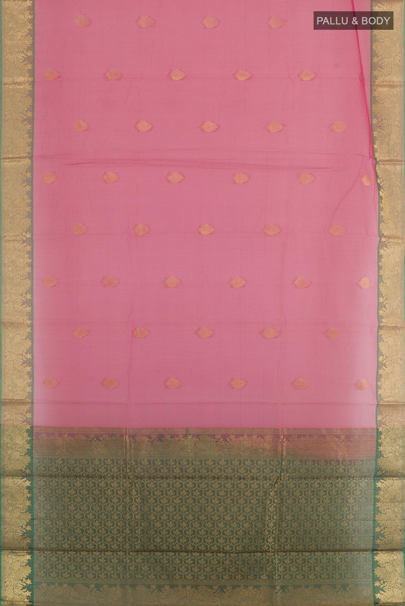 Flat view of Pink Silk Cotton Saree with Zari Butta on the body and Zari Border. 