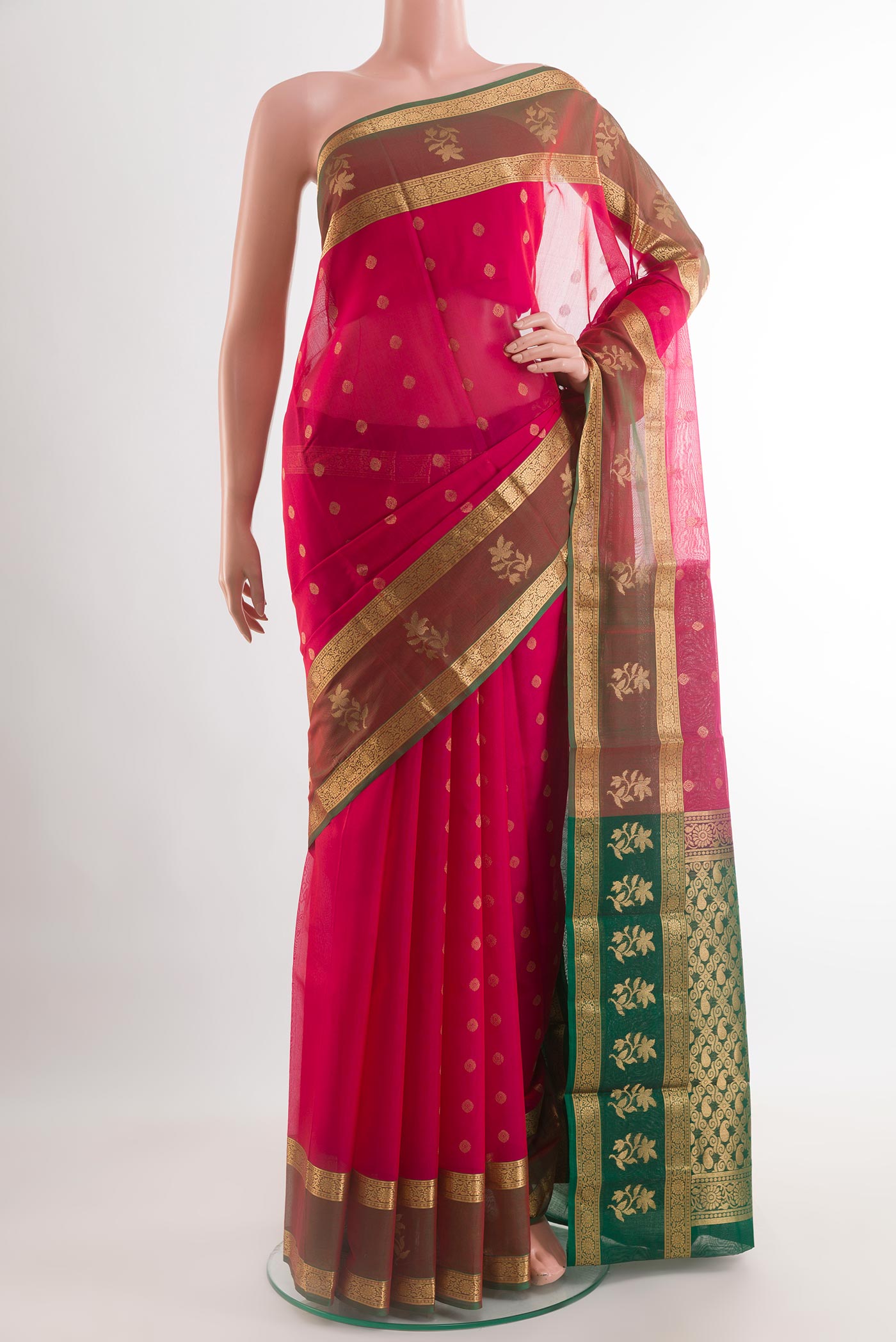 Pink Blended Kora Cotton Saree with Zari Butta on the body and Zari Border.  displayed on a mannequin